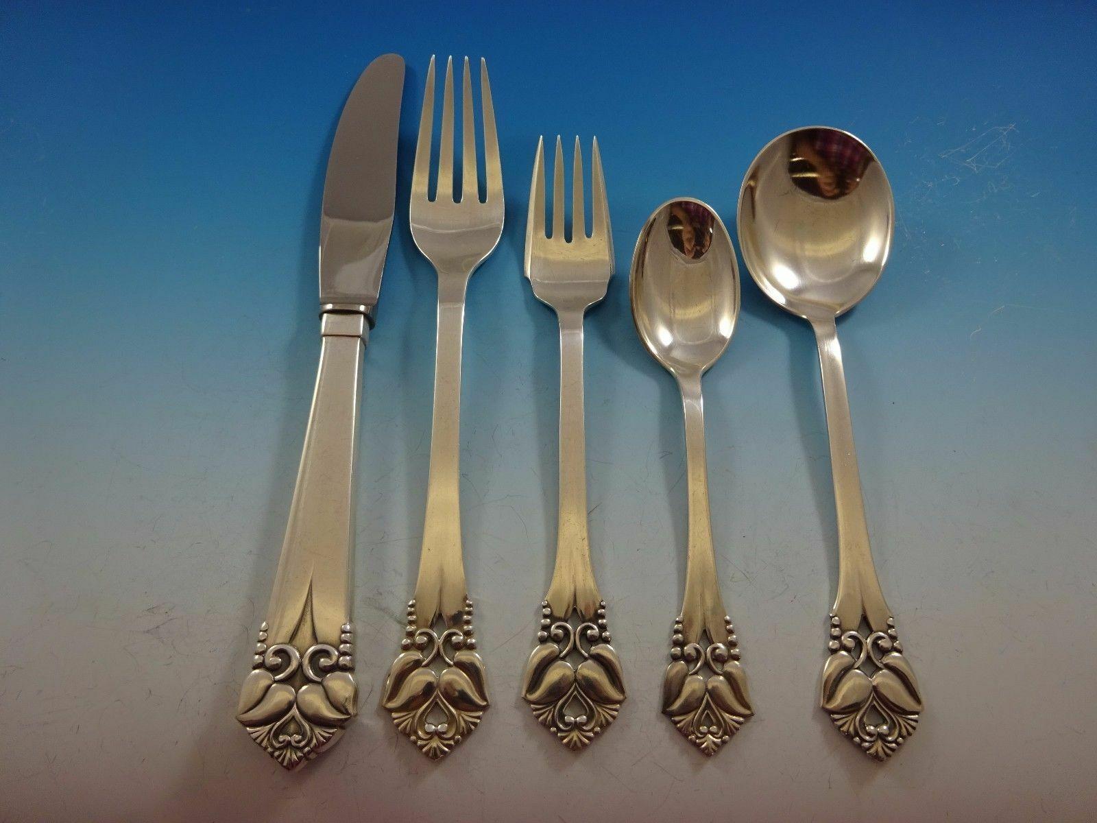 Greta by Orla Vagn Mogensen Danish sterling silver flatware set - 74 pieces. This set includes:

12 knives, long handle, 8 1/2