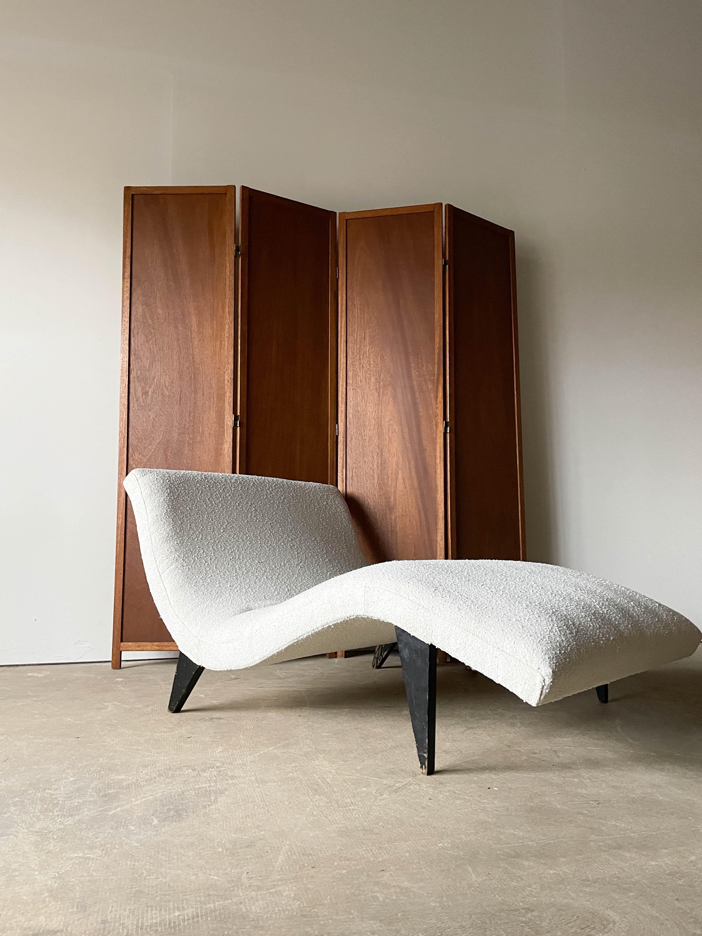 Rare and Early chaise longue designed by Greta Grossman Magnusson for Sherman Bertram in the early 1950s. This example is a wider Twin version as shown in the newspaper advert from 1953. Featuring sublime curves and high contrast ebonized oak legs,