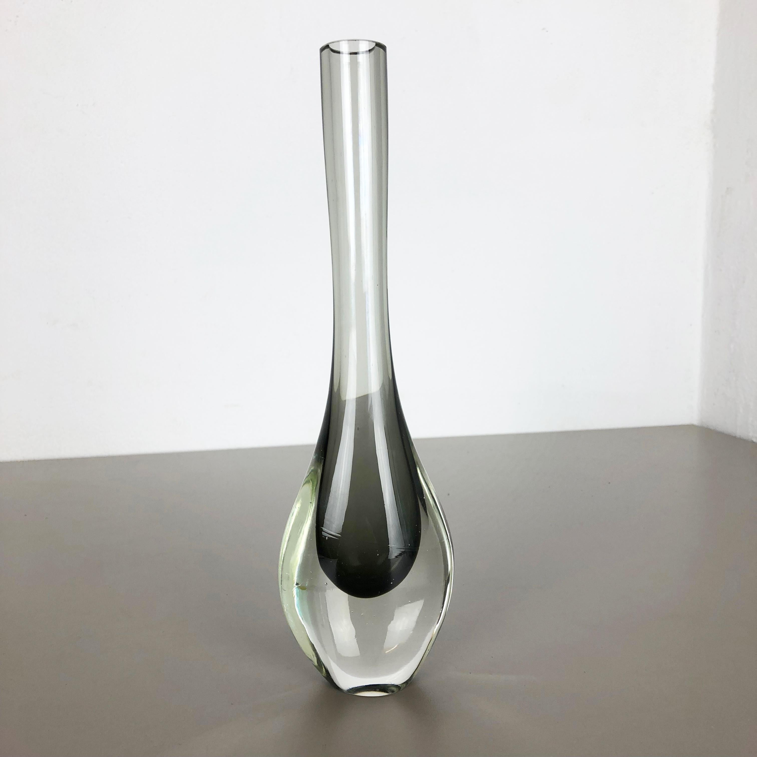 Article:

Murano glass vase

Design:

Flavio Poli


Origin:

Murano, Italy


Decade:

1970s

These original Murano glass vases was produced in the 1970s in Italy. This elegant Italian vase designed by Flavio Poli, was hand blown in