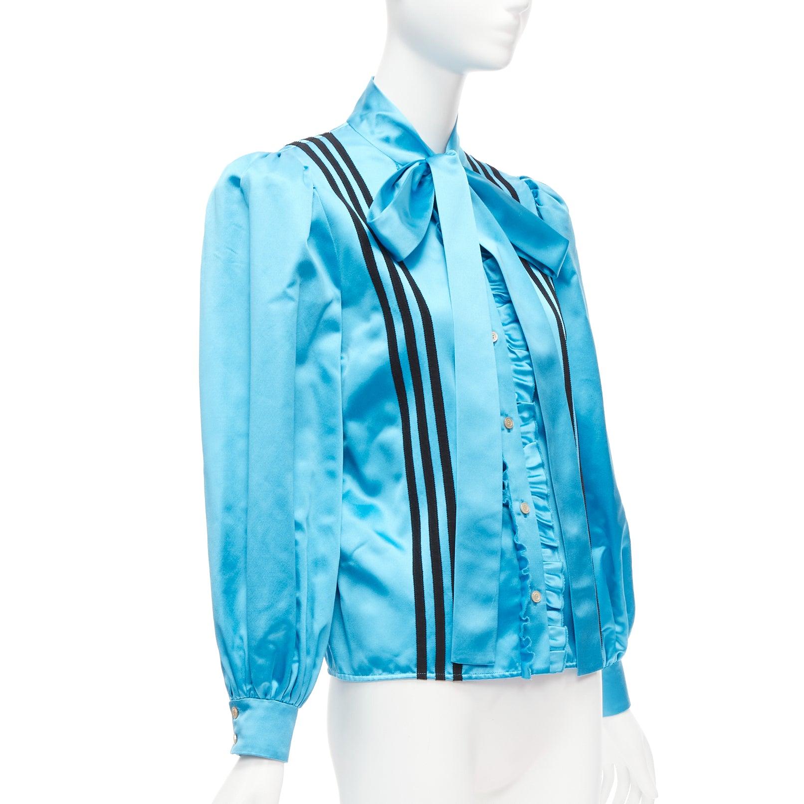 rare GUCCI ADIDAS blue silk 3 stripe pussy bow Victorian puff sleeve blouse IT38
Reference: AAWC/A00676
Brand: Gucci
Designer: Alessandro Michele
Collection: Adidas - Runway
Material: 100% Silk
Color: Blue, Black
Pattern: Solid
Closure: Button
Extra