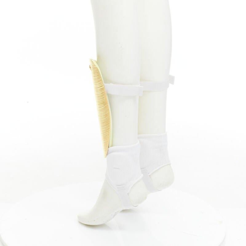rare GUCCI Alessandro Michele 2019 Runway GG logo gold padded shin guards socks For Sale 1