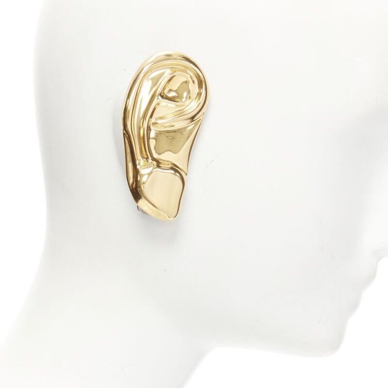 rare GUCCI ALESSANDRO MICHELE Runway Surrealist gold ear clip on earring single
Reference: TGAS/C01502
Brand: Gucci
Designer: Alessandro Michele
Model: 595631 I4600 0707
Collection: Runway
Material: Metal
Color: Gold
Pattern: Solid
Closure: Clip