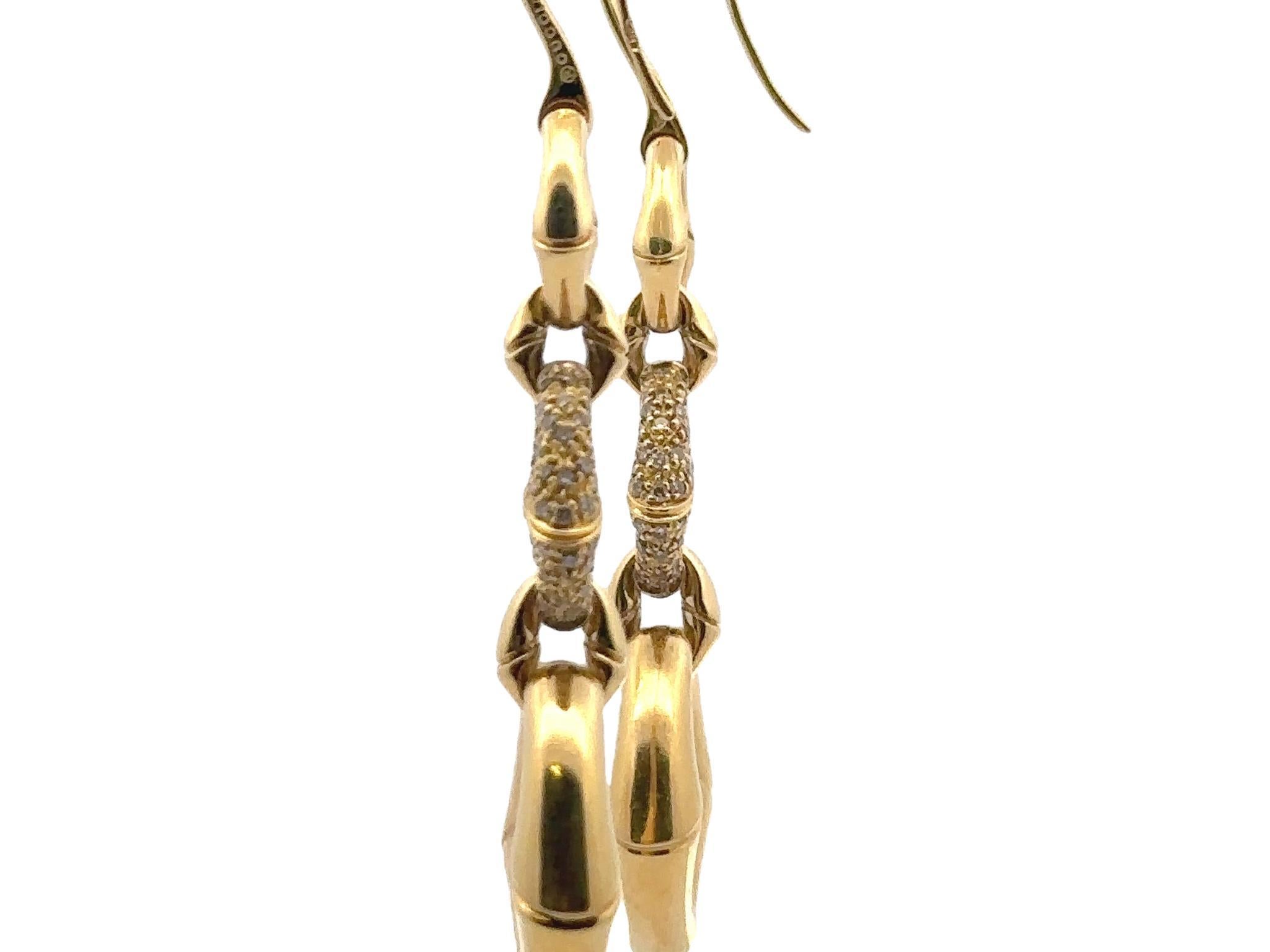 The Gucci Bamboo Collection Diamond Drop Earrings are a bold statement piece for any occasion. Made in 18-karat yellow gold, these earrings feature Gucci’s signature bamboo-inspired motif and are hand hammered adding a textured element to the