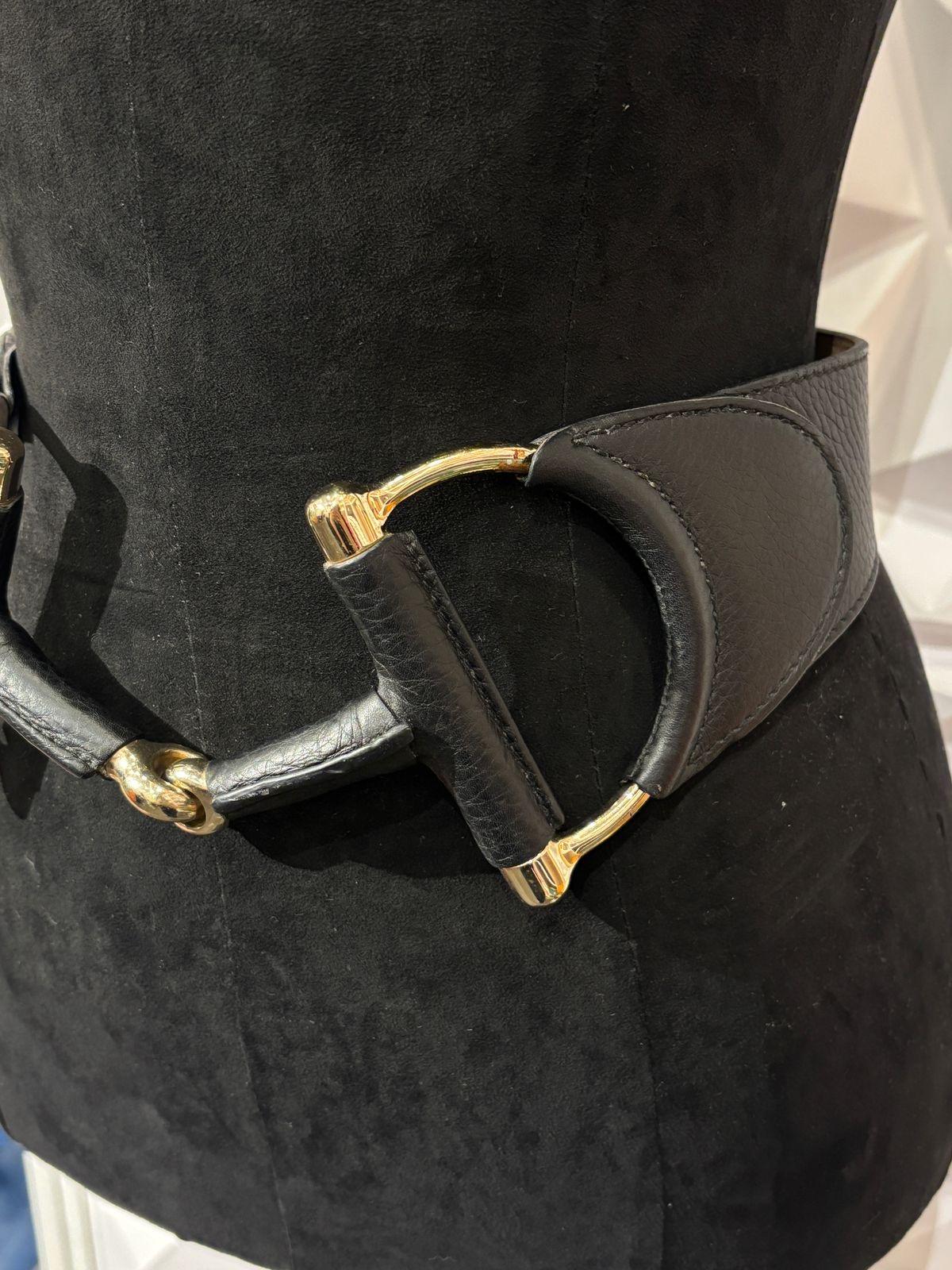 Beautiful Gucci oversized horsebit belt. A very simple yet impactful statement piece. Easy to match. Size 75. Adjustable with belt loops. Comes as is. Minor tarnishing on the corners. 