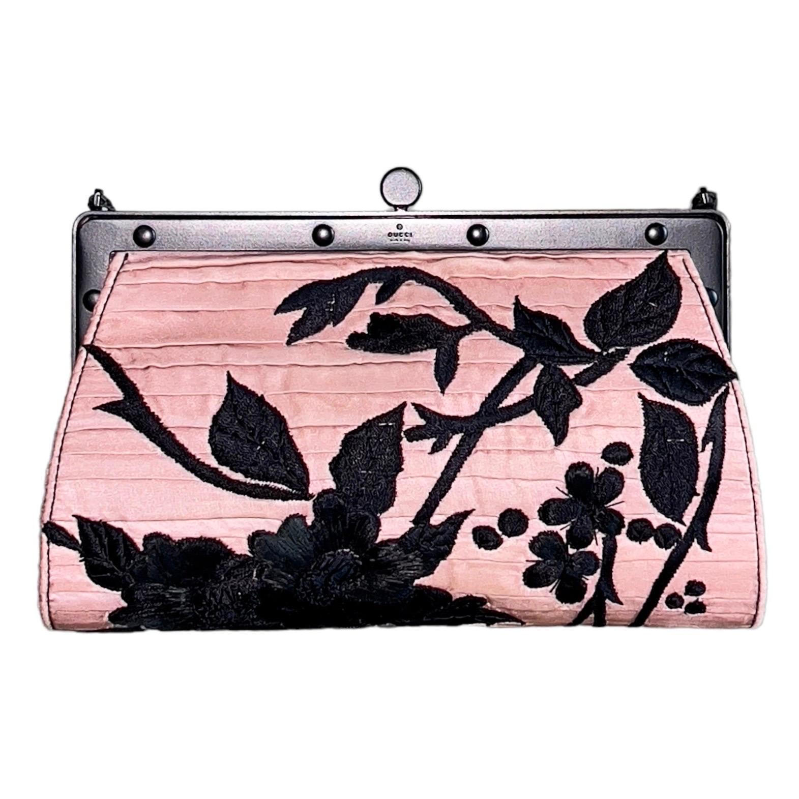 EXTREMELY RARE „KIMONO“ Bag by TOM FORD for GUCCI SS 2003

Very rare and exclusive GUCCI signature piece
Collector's Item!
Pink frayed, layered silk
Black hand-embroidery
Mat black tone metal hardware
Braided leather strap with tassel details 
Lined