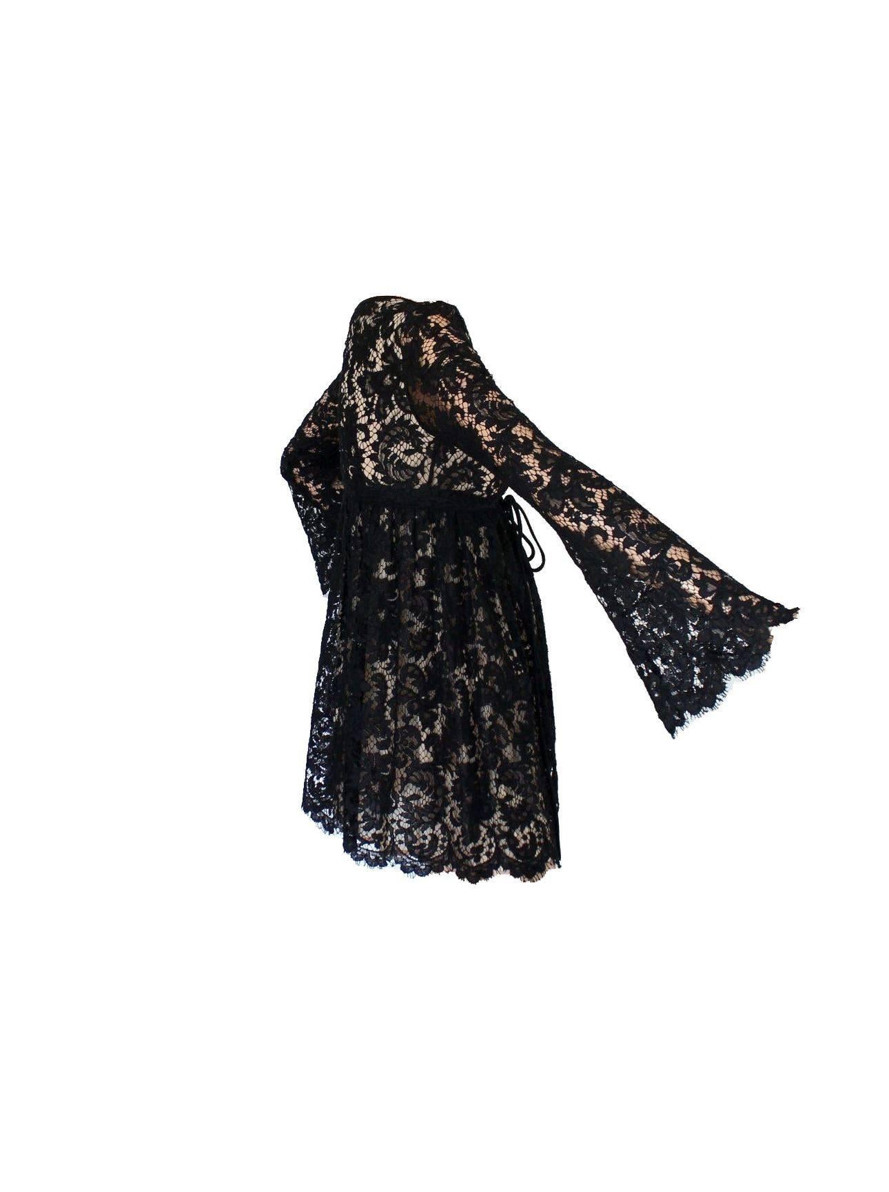Stunning Gucci by Tom Ford lace dress
From his SS 1996 collection for Gucci
Finest black lace
Fully lined with nude silk

Made in Italy
Dry Clean Only
Size 38

Seen in the AD campaign and on the runway show for season reference only