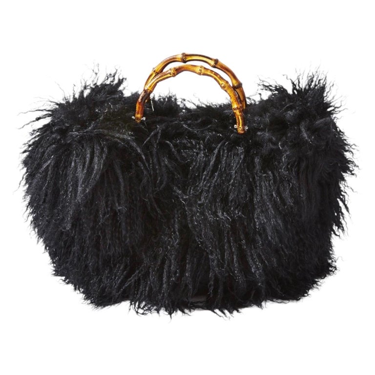 EXTREMELY RARE GUCCI BY TOM FORD
SS 1996
GUCCI FUR BAG
SEEN ON KATE MOSS
FEATURED ON BOTH GUCCI'S RUNWAY SHOW SS 1996 AND IN GUCCI'S AD CAMPAIGN


    Very rare and exclusive GUCCI signature piece
    Collector's Item! Limited Edition from GUCCI SS
