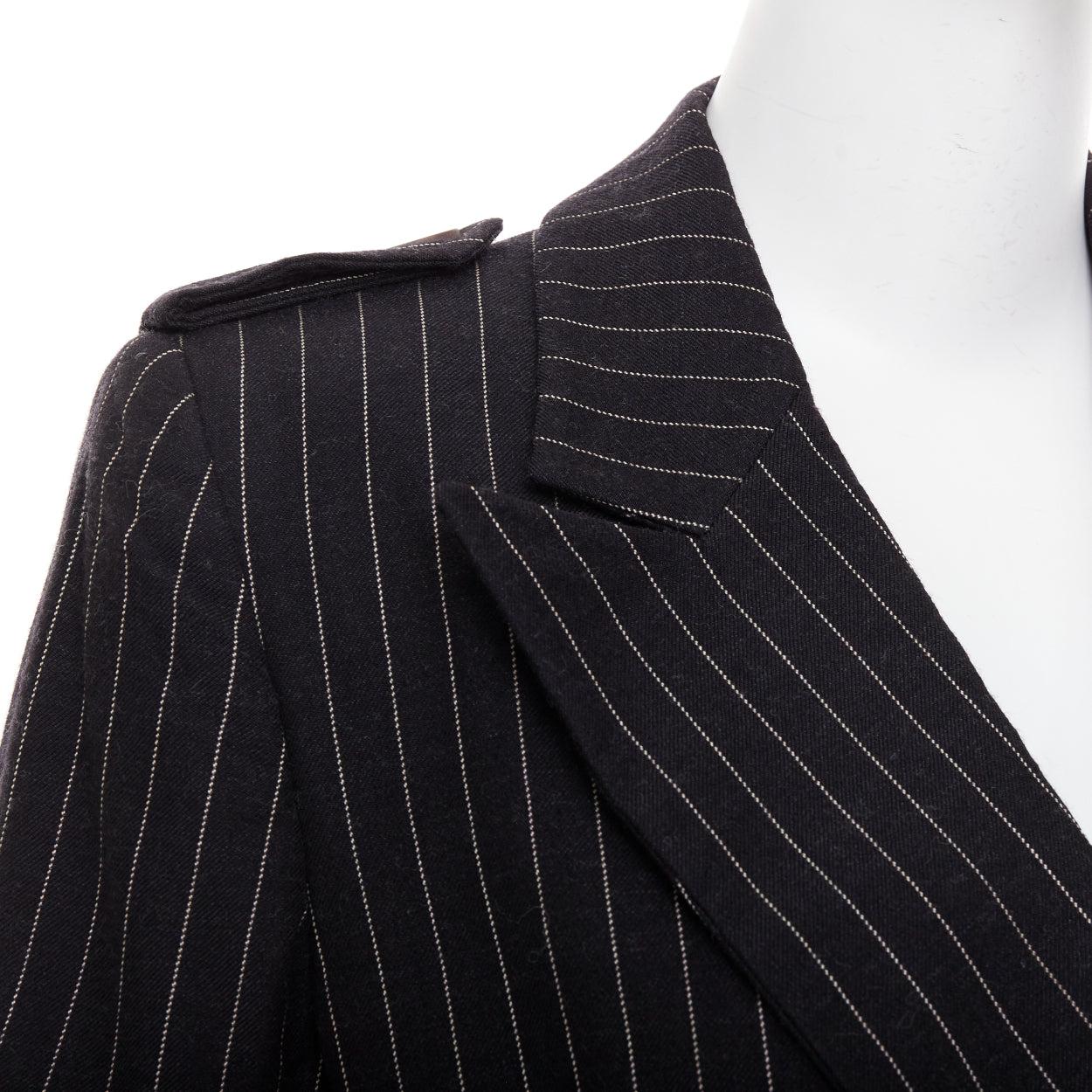 rare GUCCI Tom Ford 1996 Vintage Runway black wool pinstripe overcoat IT42 M
Reference: TGAS/F00150
Brand: Gucci
Designer: Tom Ford
Collection: AW 1996 - Runway
As seen on: Amy Wesson
Material: Wool
Color: Black, Cream
Pattern: Pinstriped
Closure: