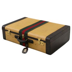 Rara valigia da viaggio Gucci in tessuto e pelle, etichetta originale