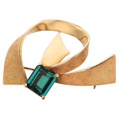 Raro ciondolo a spilla modernista H. Stern Mid-Century in oro 18 carati con tormalina blu-verde Raro ciondolo a spilla modernista H. Stern Mid-Century in oro 18 carati con tormalina blu-verde