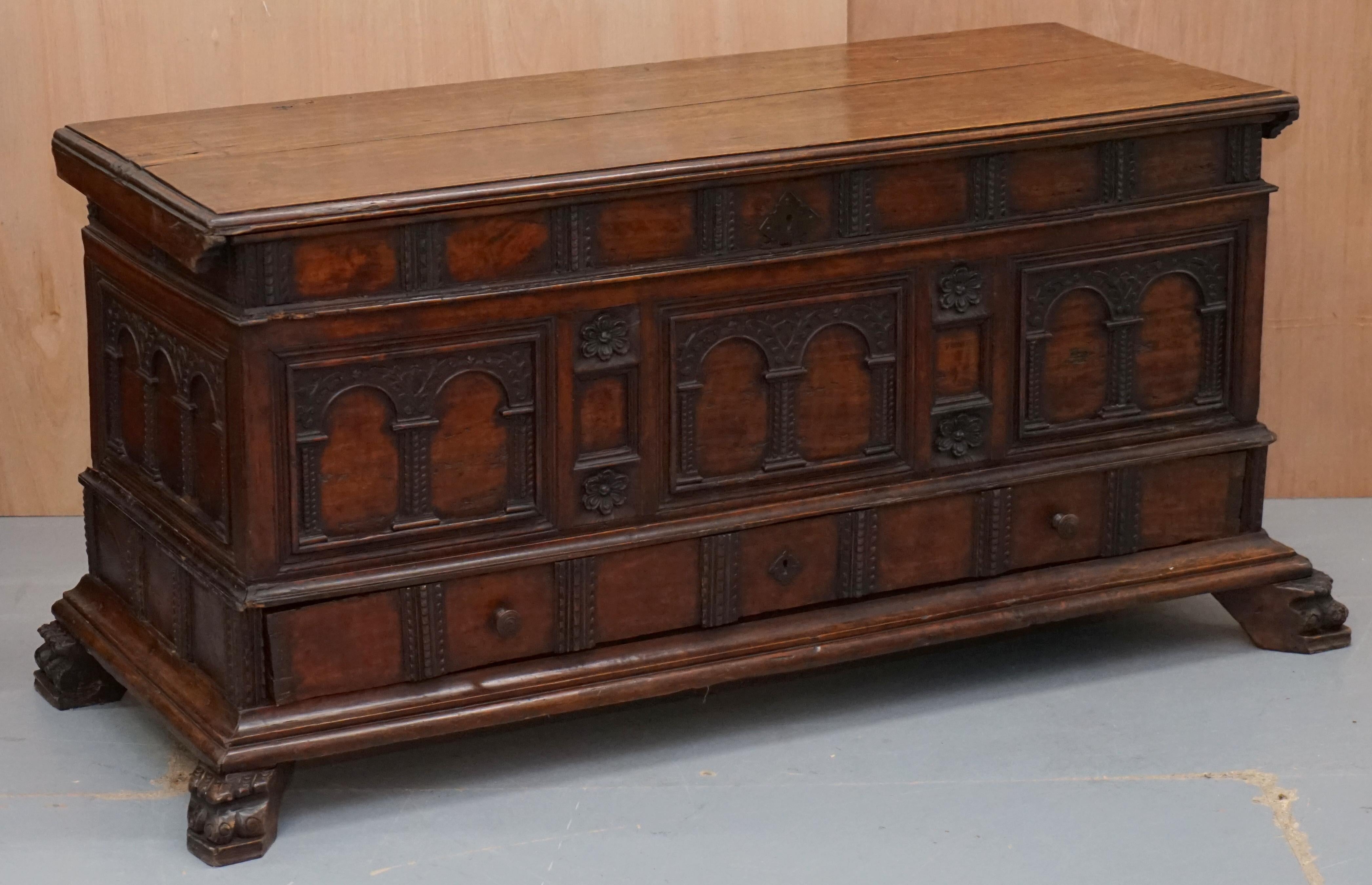 we are delighted to this very rare hand carved 18th century walnut Cassone trunk or blanket box

A very good looking and decorative piece of furniture, hand carved all-over from solid lumps of walnut. The chest sits on top of the original plinth