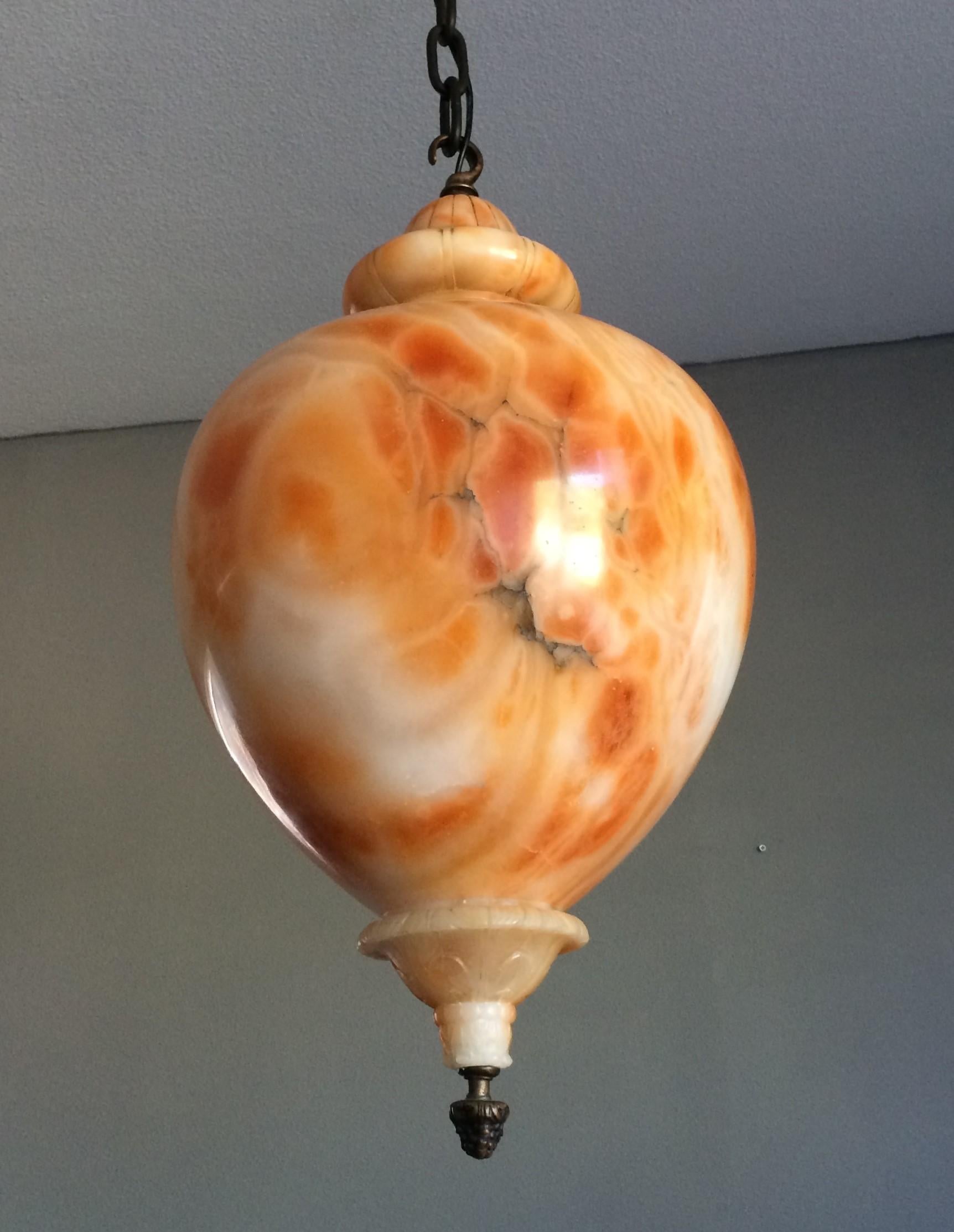 Stunning and sizeable alabaster light fixture with an Eastern look and feel.

Over the years we have sold a number of rare and beautiful alabaster light fixtures, but we have never seen one like this. If you are looking for an alabaster light for