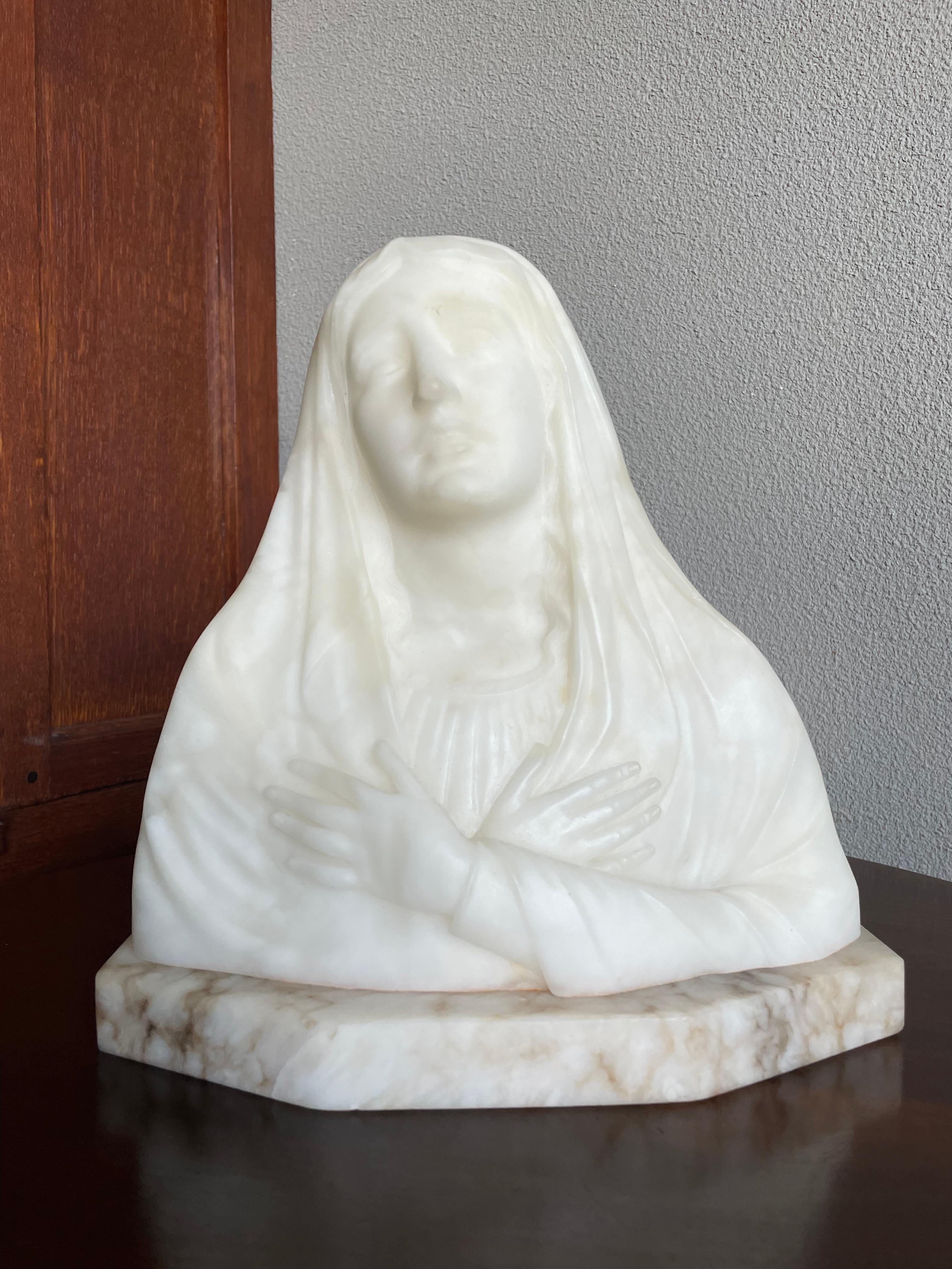 Mid size, finest quality carved alabaster Madonna sculpture on a marble base. 

If you are a collector of antique and finest quality religious artefacts then this hand carved Virgin Mary could be gracing your home or house of prayer soon. Judging