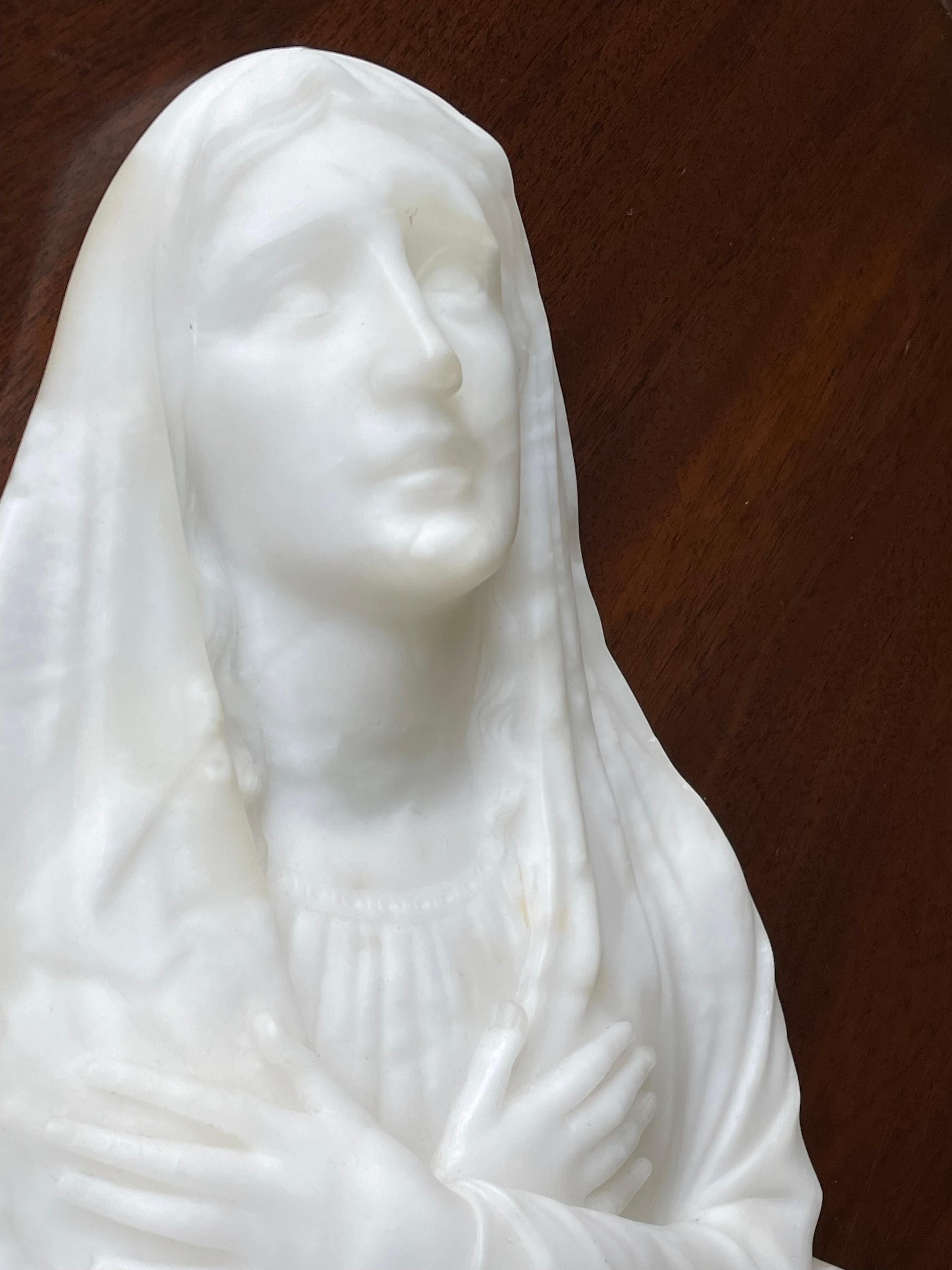 statue of mourning virgin mary