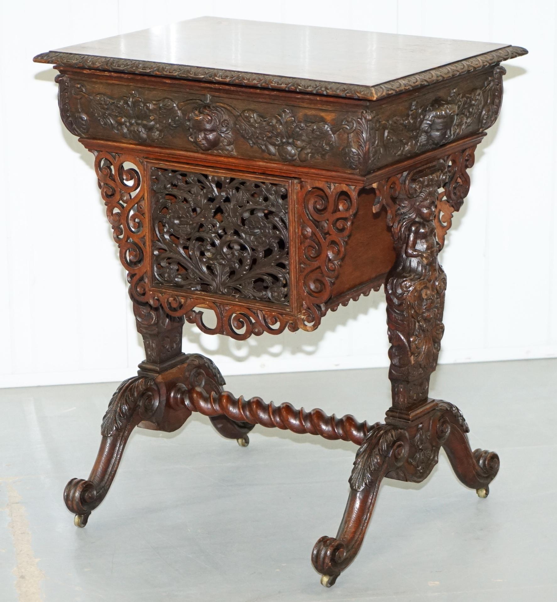 English Rare Hand Carved Solid Oak Victorian Sewing Table with Putti Angels 17th Century