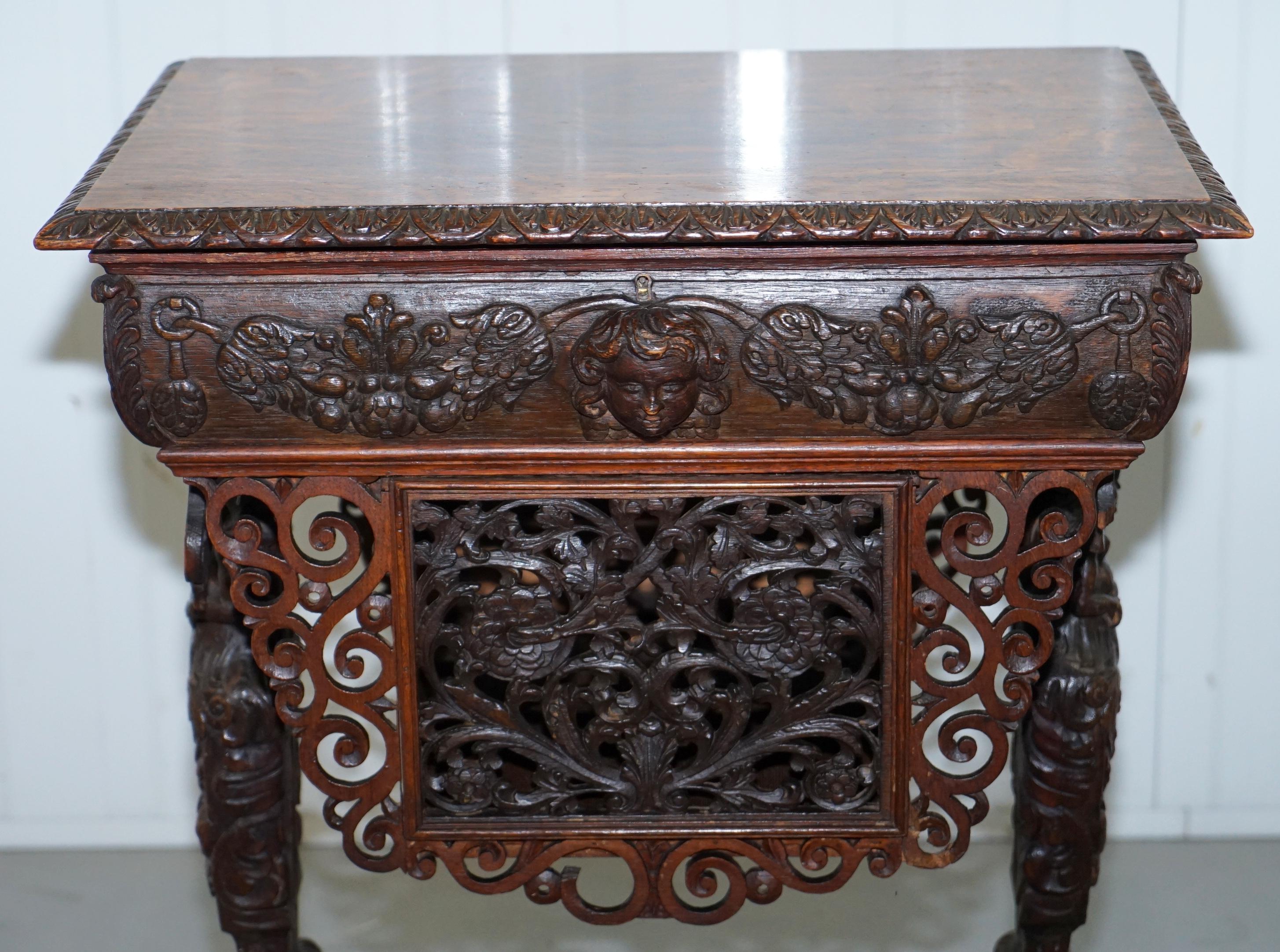 19th Century Rare Hand Carved Solid Oak Victorian Sewing Table with Putti Angels 17th Century