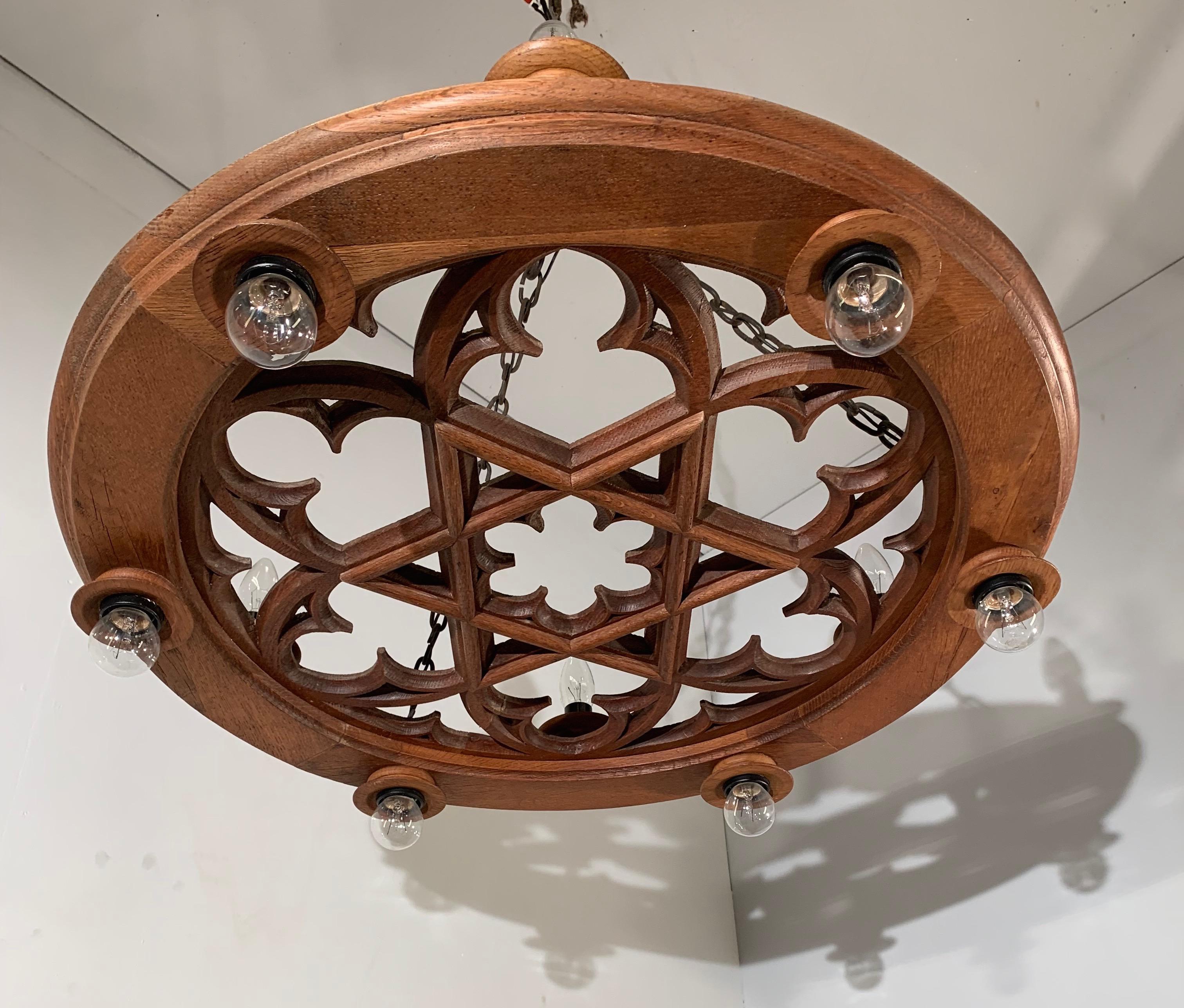 Antique, good size and excellent quality Gothic Revival light fixture. 

If you have visited Gothic churches then you may have immediately recognized the wonderful shape of this Gothic chandelier. It is exactly like the circular design that you find