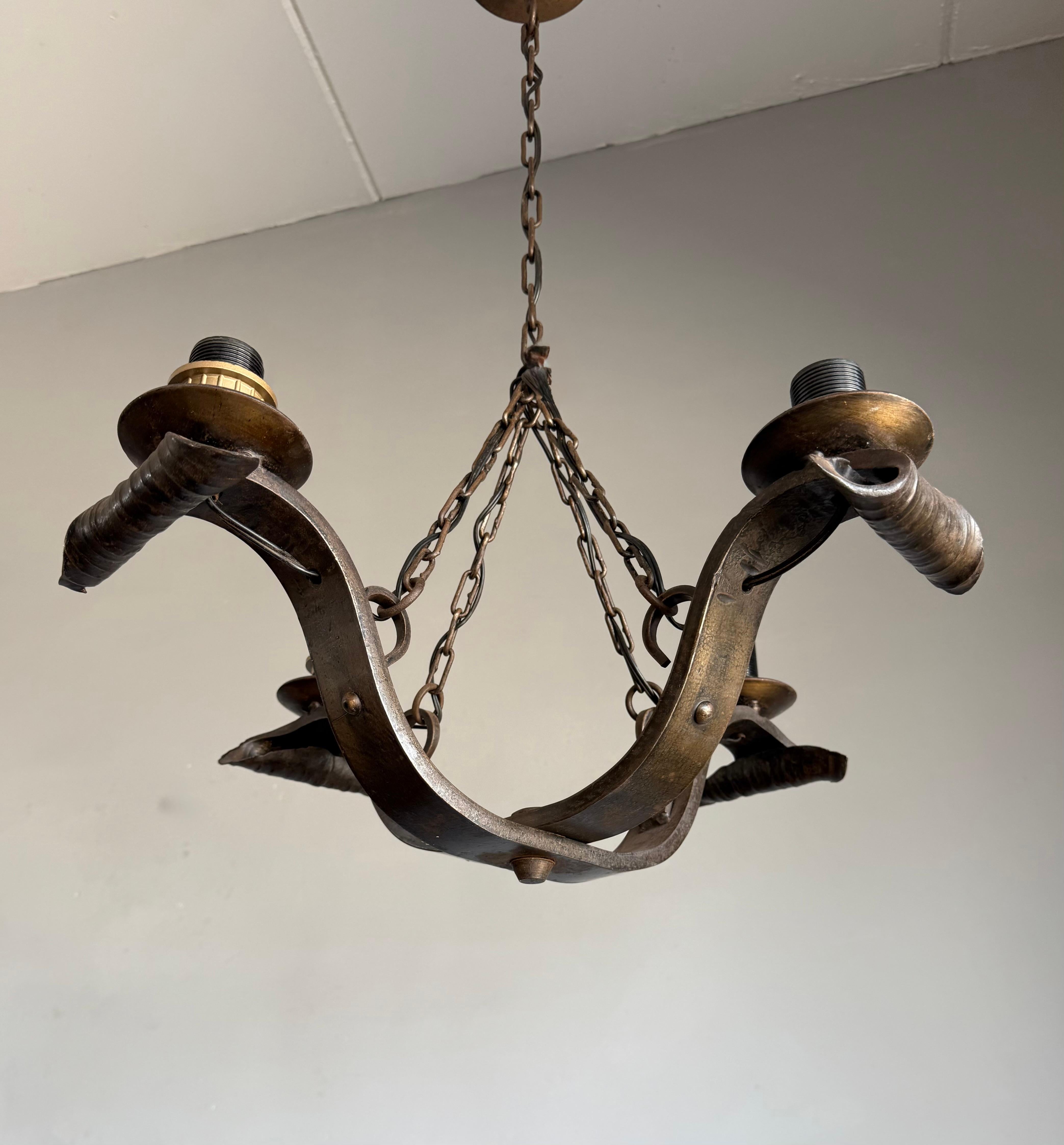 Rare Hand-Forged Wrought Iron 4-Light Chandelier with Sculptural Curl Detailing In Excellent Condition For Sale In Lisse, NL