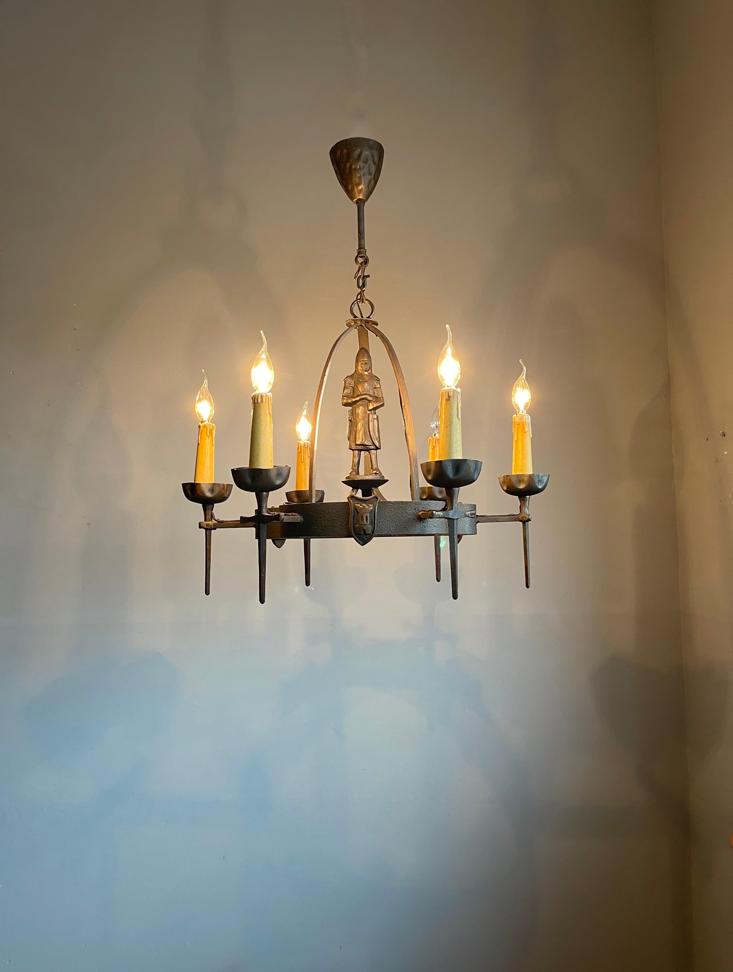 Stylish and highly decorative six-light medieval style pendant light.

With early 20th century lighting as one of our specialities, we have seen a lot of great and unique fixtures, but never did we come across a handcrafted, mediëval style pendant