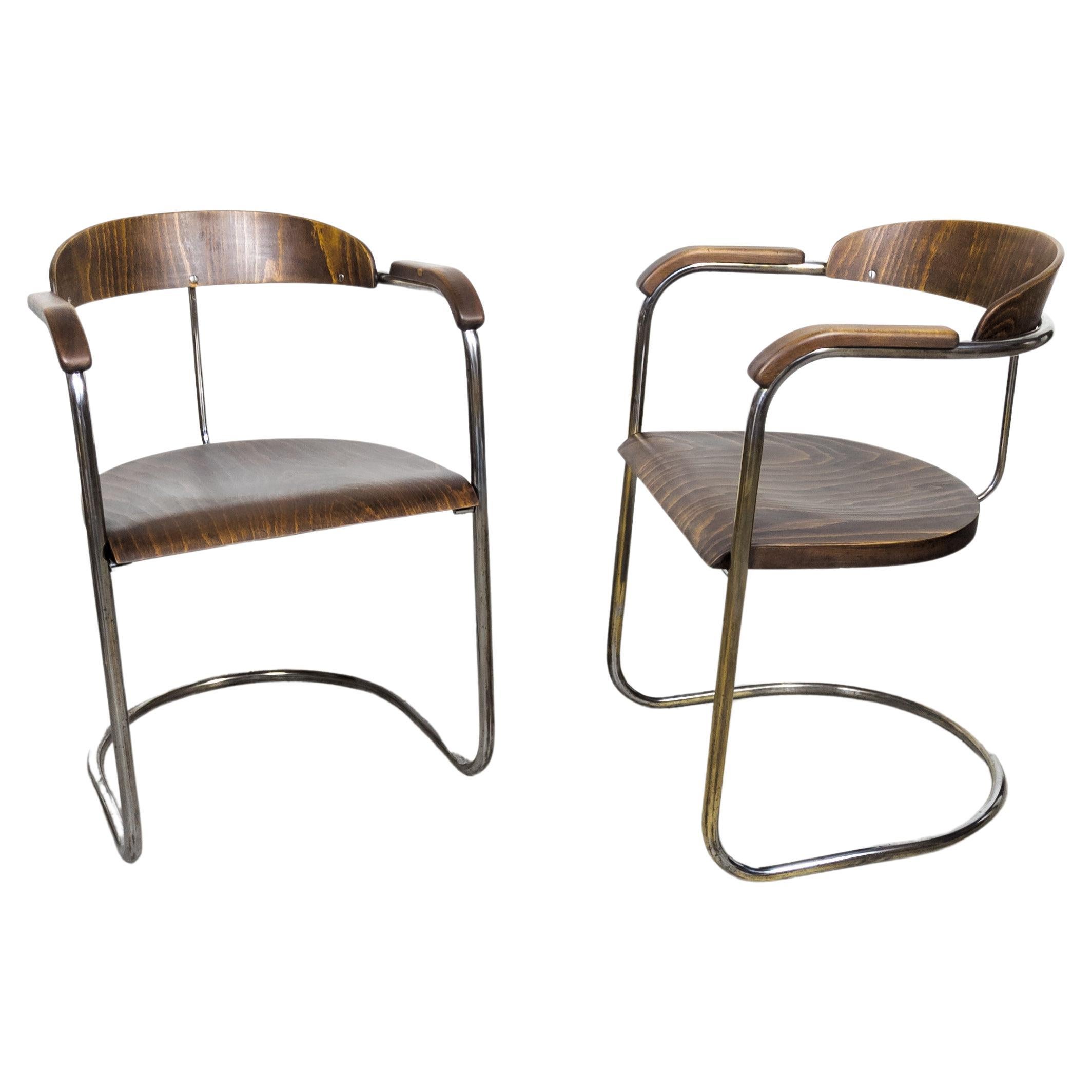 Rare Hans and Wassily Luckhardt SS 33 armchairs variant  For Sale