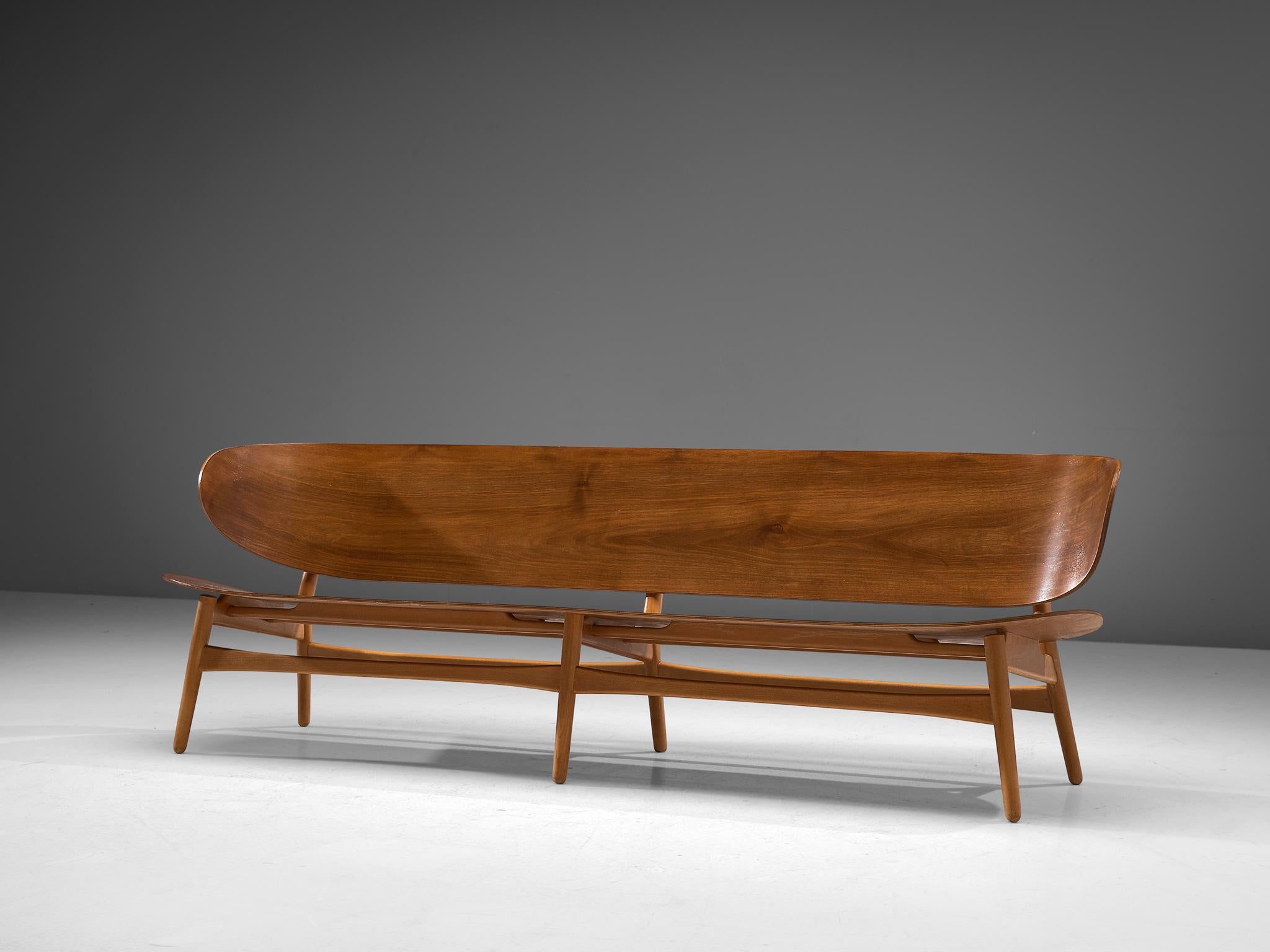 Hans J. Wegner for Fritz Hansen, FH 1935/4 bench, walnut, beech, Denmark, design 1948, manufactured 1950s

This is a rare and largest version ever made of the 'FH 1935' bench or sofa by Hans J. Wegner. This piece is one of the results of Wegner's