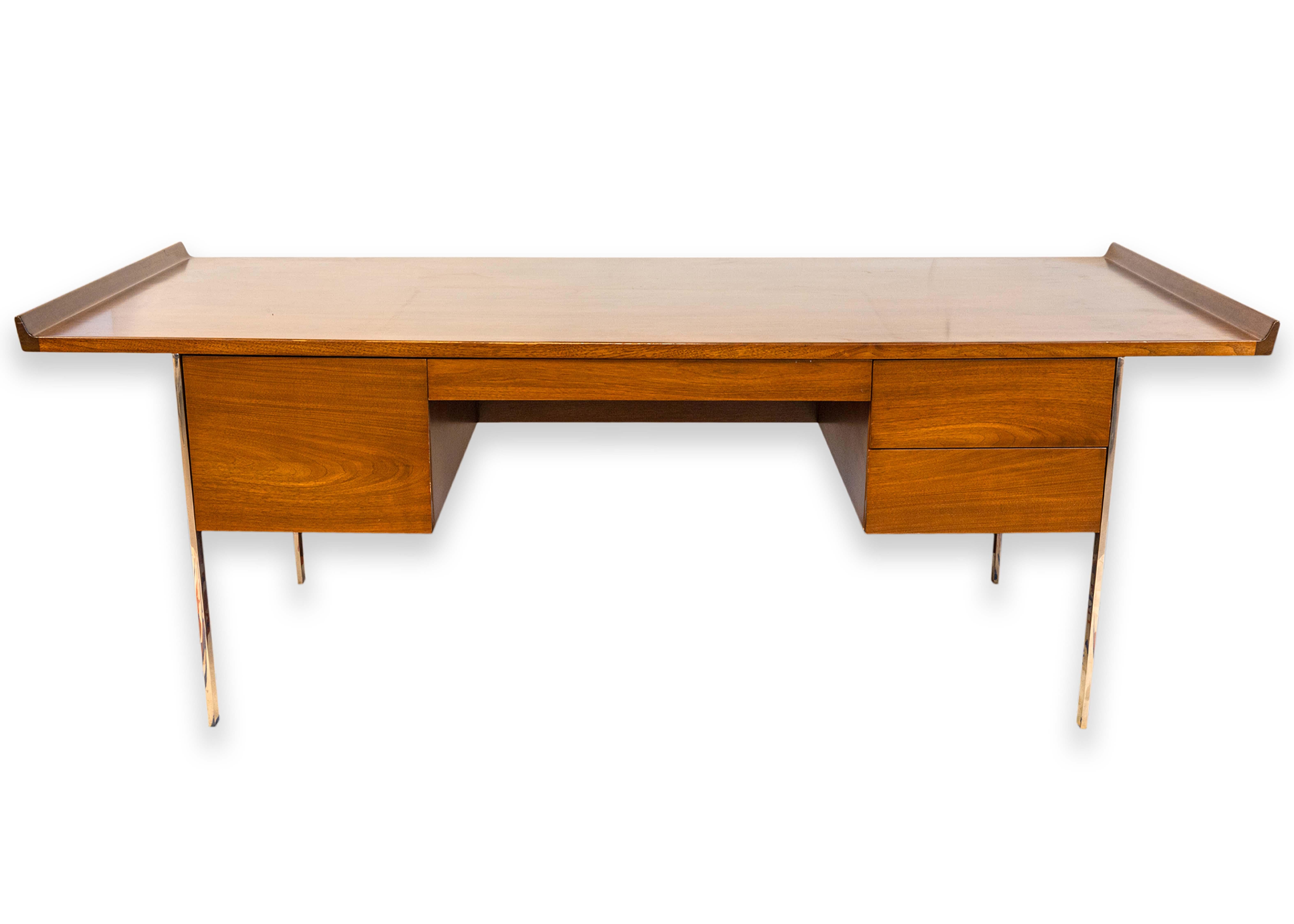 A rare Harvey Probber executive writing desk. This insanely cool mid century modern desk is made by world renown designer Harvey Probber. Probber was an American furniture designer that had a knack for simple, functional design, with a very clean,