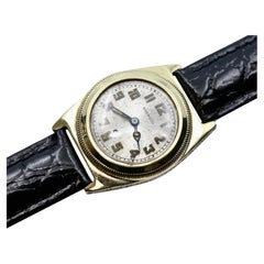 Rare montre-bracelet automatique Harwood en or massif 14 carats