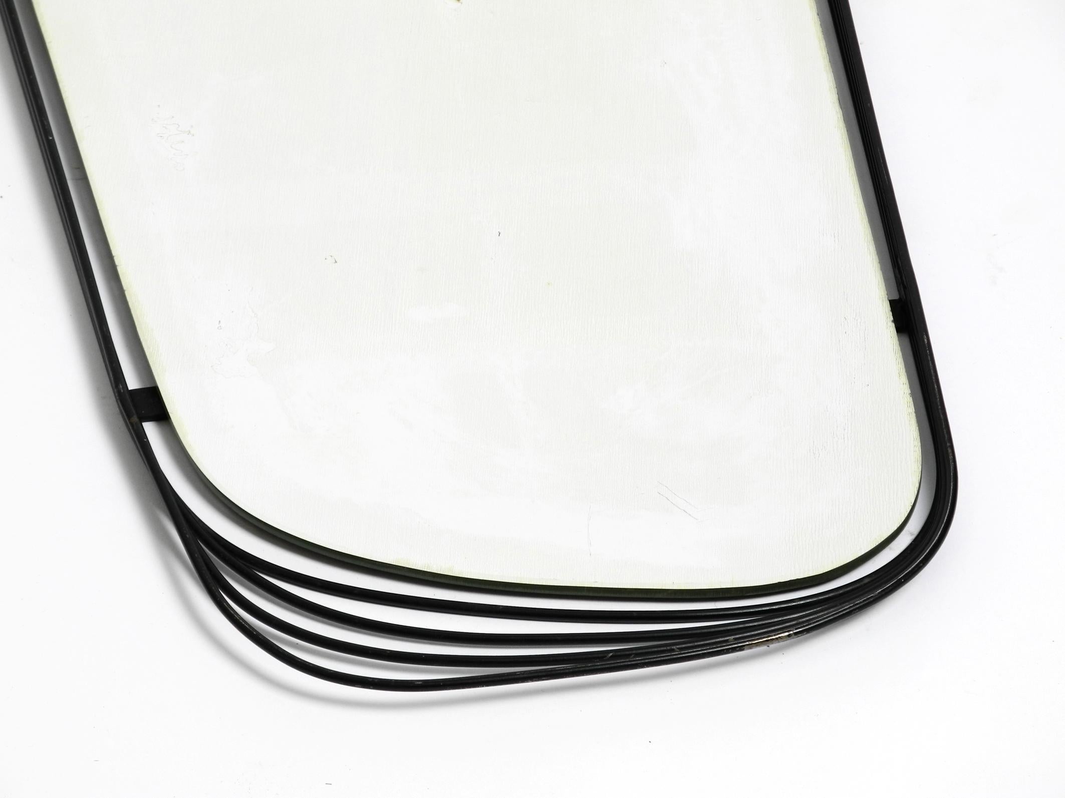 Rare Heavy Mid-Century Modern Wall Mirror with a Black Abstract Metal Frame For Sale 7