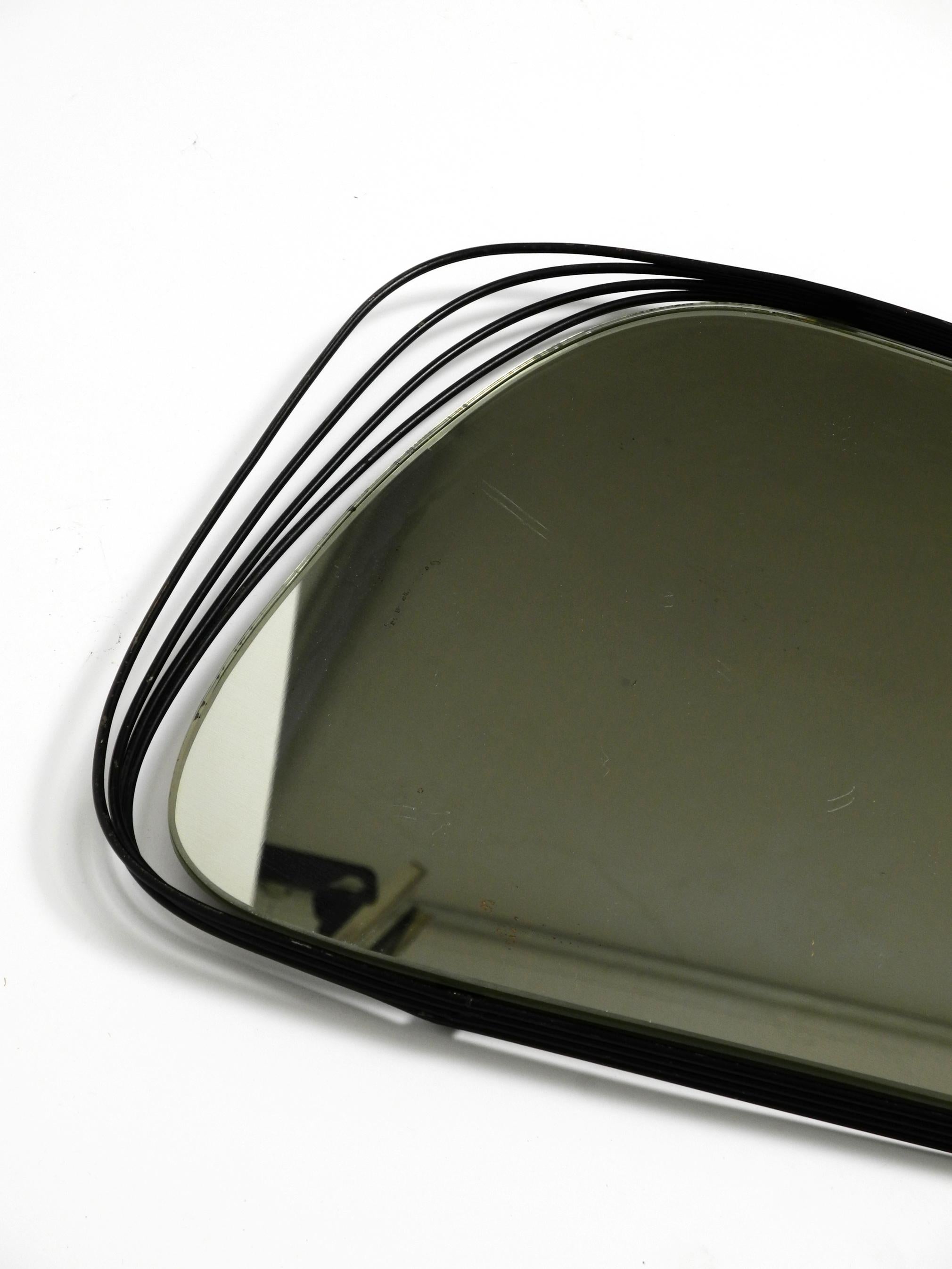 Rare Heavy Mid-Century Modern Wall Mirror with a Black Abstract Metal Frame For Sale 11
