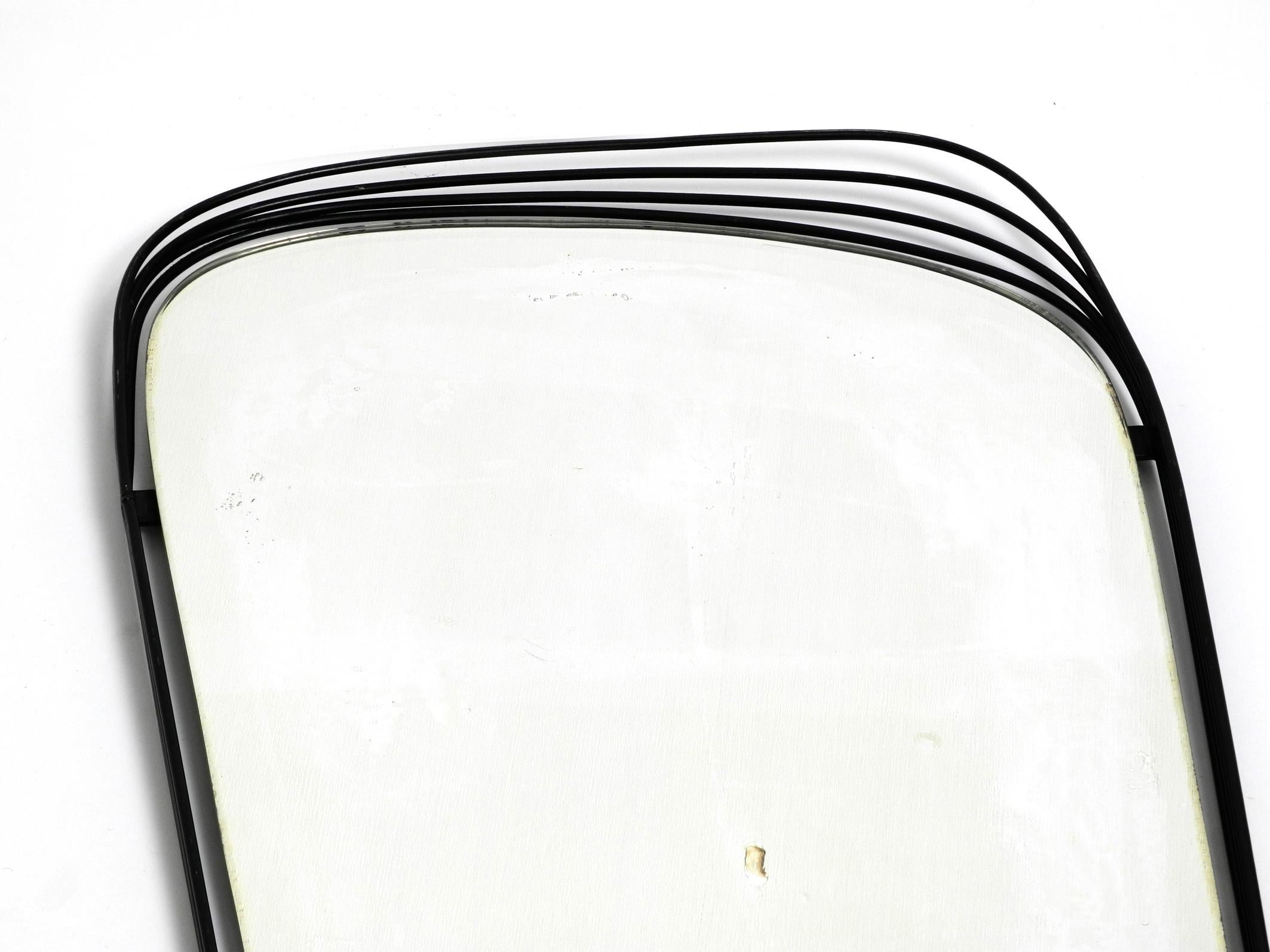 Rare Heavy Mid-Century Modern Wall Mirror with a Black Abstract Metal Frame In Good Condition For Sale In München, DE