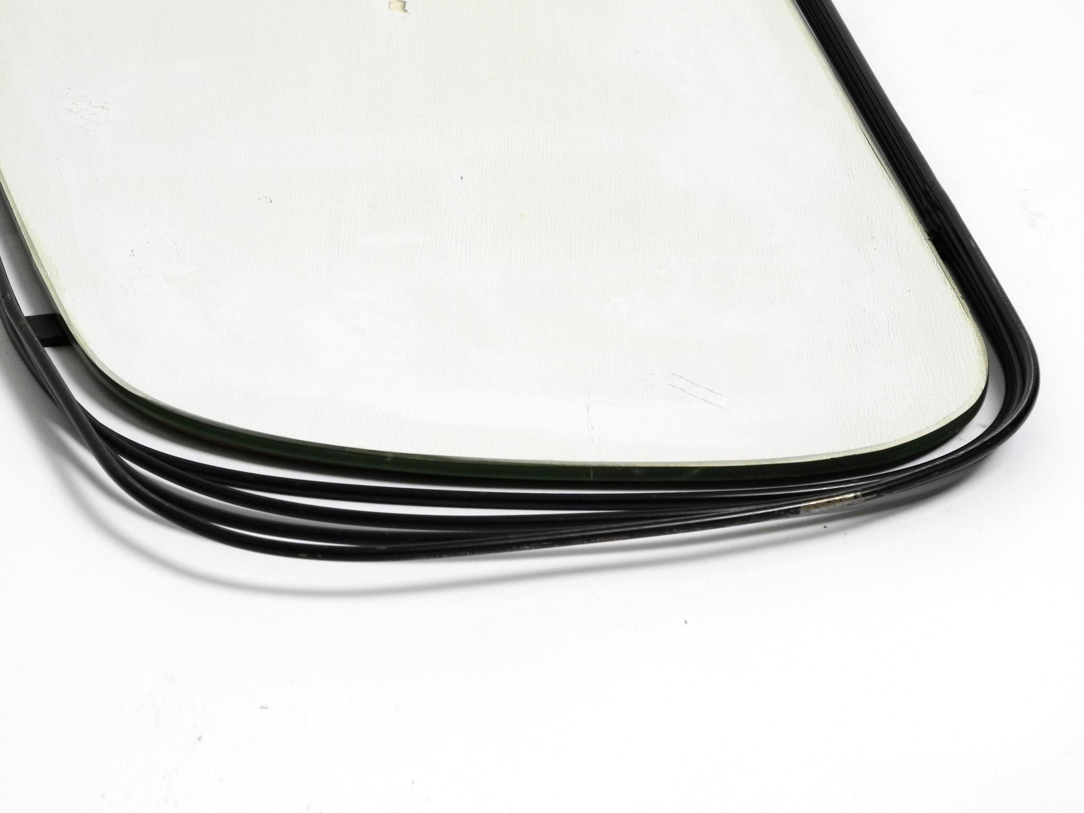 Rare Heavy Mid-Century Modern Wall Mirror with a Black Abstract Metal Frame For Sale 2