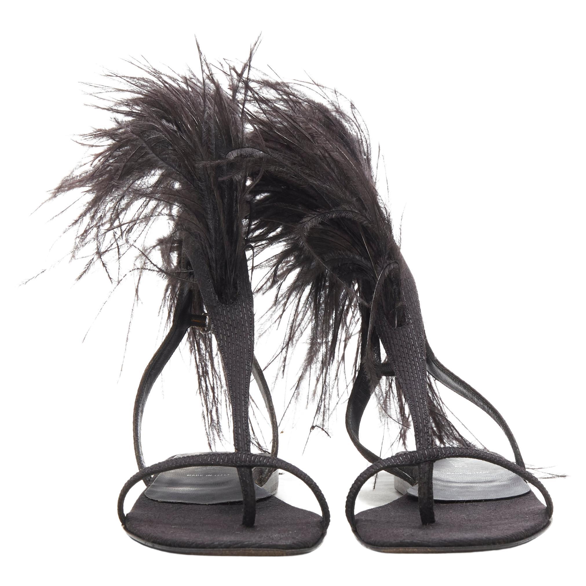 rare HELMUT LANG Vintage black feather trim T-strap open toe flat sandals EU36
Brand: Helmut Lang
Designer: Helmut Lang
Material: Fabric
Color: Black
Pattern: Solid
Closure: Hook & Bar
Extra Detail: Textured fabric upper. T-strap thong sandal.