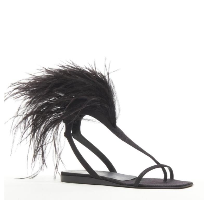 rare HELMUT LANG Vintage black feather trim T-strap open toe flat sandals EU36
Reference: ANWU/A00989
Brand: Helmut Lang
Designer: Helmut Lang
Material: Fabric, Feather
Color: Black
Pattern: Solid
Closure: Hook & Bar
Lining:  Fabric
Extra Details: