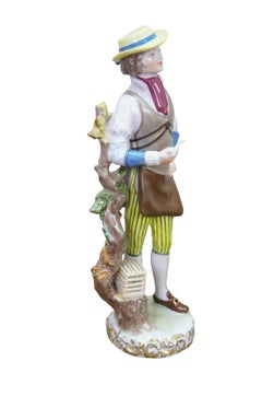 Rara figurita de porcelana de Herend (Hungría) titulada «El vendedor de pájaros», obra de Wéninger Lászlóné