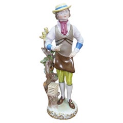 Rara figurita de porcelana de Herend (Hungría) titulada «El vendedor de pájaros», obra de Wéninger Lászlóné