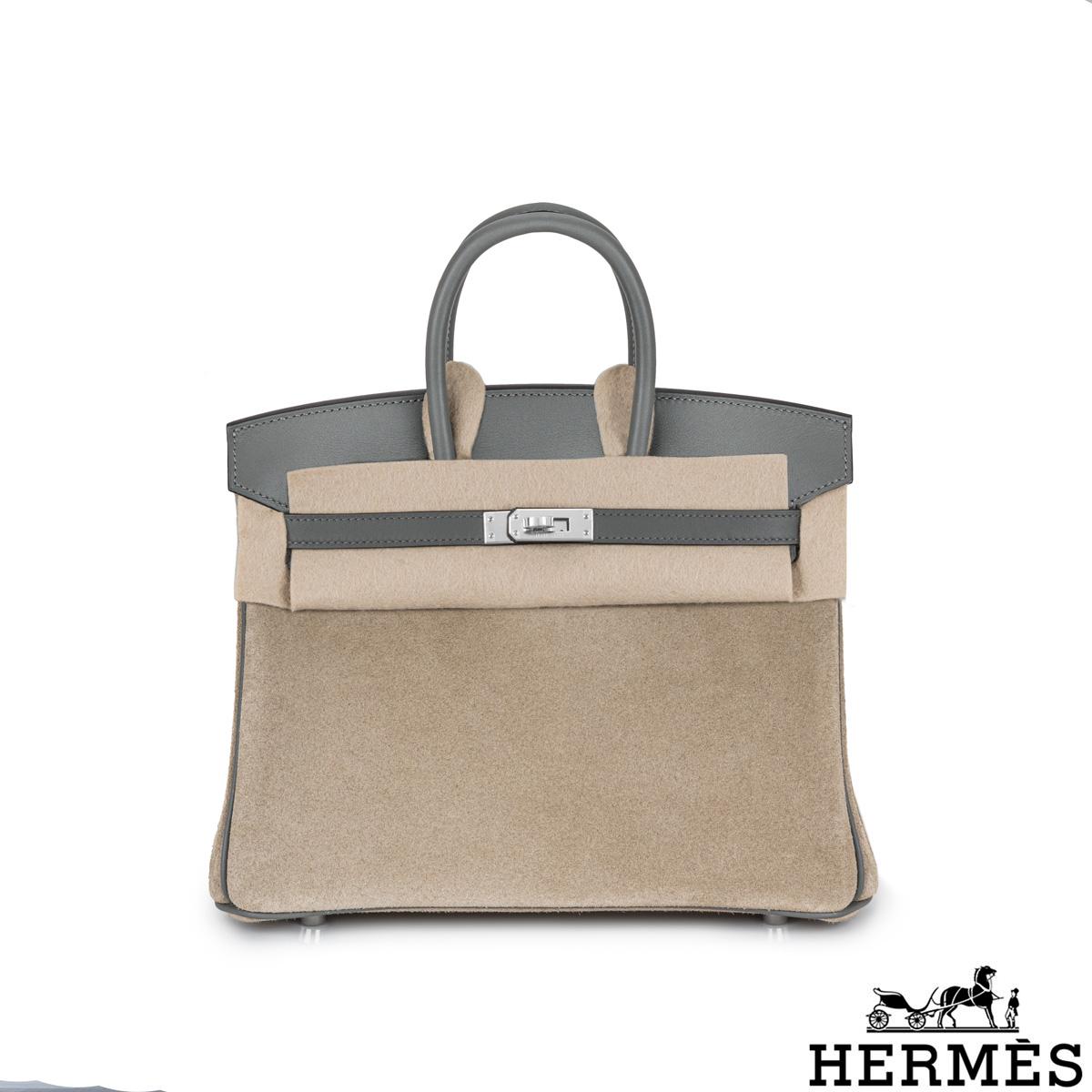 A rare Hermès Birkin 25cm handbag. The Grizzly Birkin is the namesake edition designed to showcase Veau Doblis Suede. The exterior of this Birkin is crafted in Gris Caillou Grizzly and Gris Meyer Veau Swift leather with tonal stitching. It features