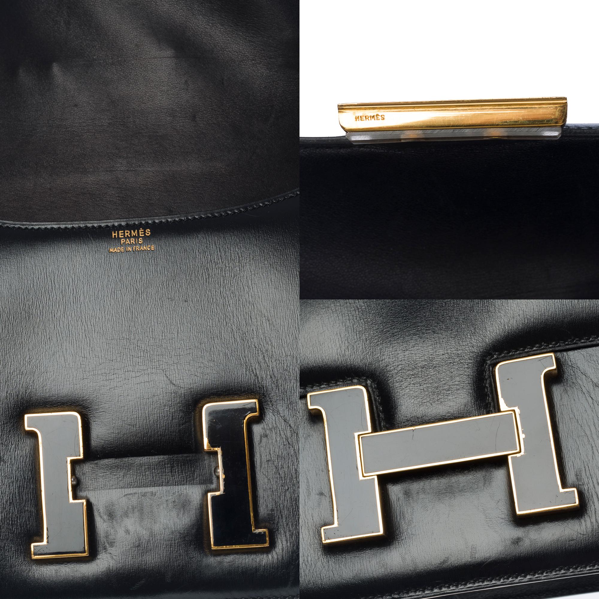 Hermès Rare sac à bandoulière Constance 23 en cuir de veau noir, or et émail en vente 2