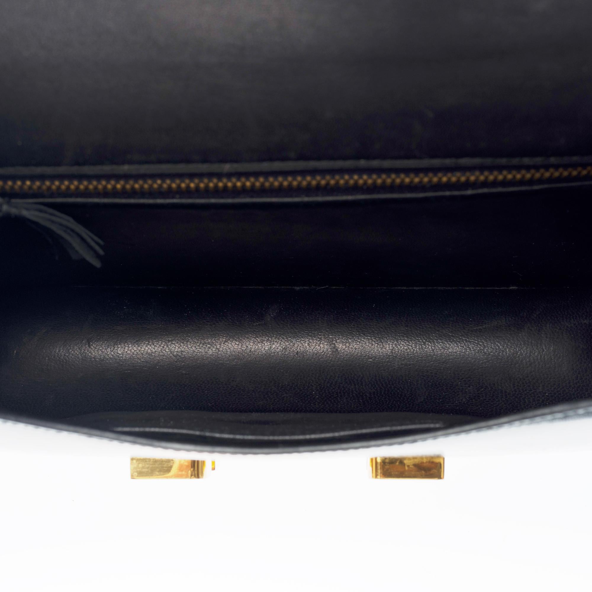 Hermès Rare sac à bandoulière Constance 23 en cuir de veau noir, or et émail en vente 4