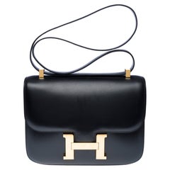 Rara borsa a tracolla Hermès Constance 23 in  Scatola nera in pelle di vitello , GHW
