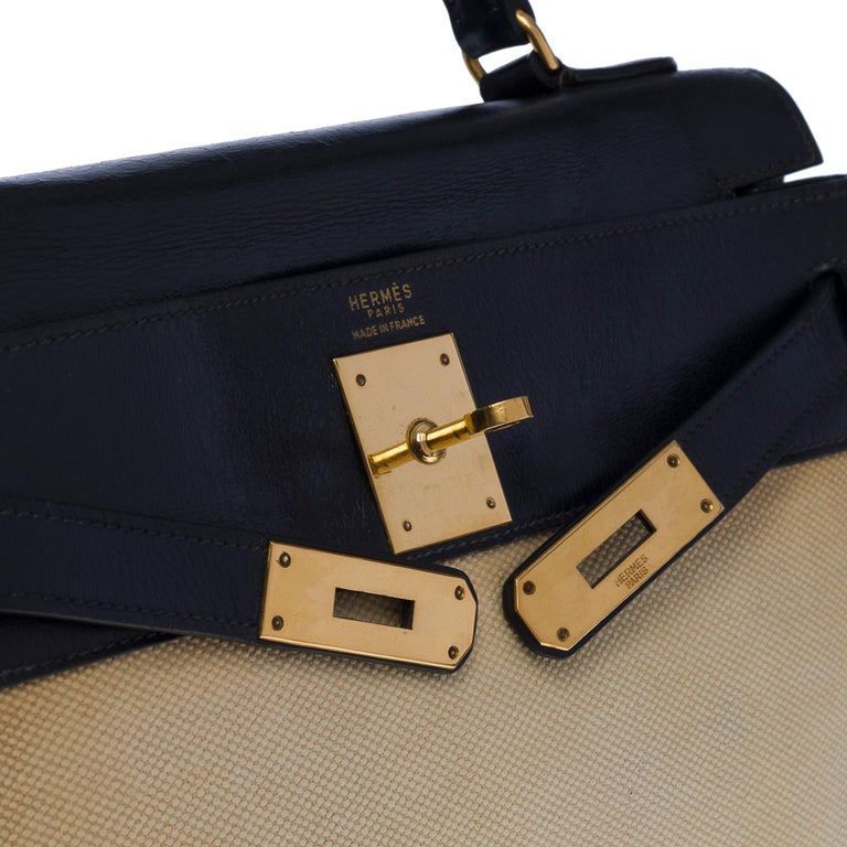 HERMES Rare Kelly 28 handbag in beige canvas and navy blue calf leathe