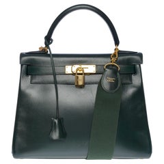 Rare Hermès Kelly 28 retourne handbag strap in green box calf leather, GHW