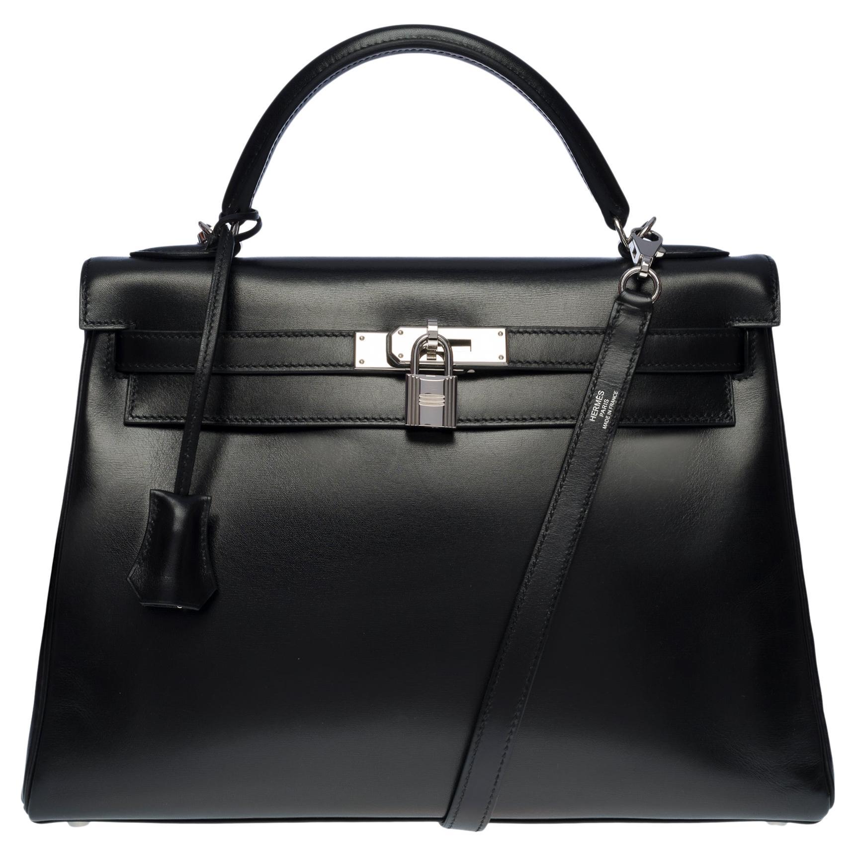 Rare Hermès Kelly 32 retourne handbag strap in black box calf leather, SHW