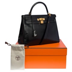 Rare Hermès Kelly 32 retourne handbag strap in black box calfskin leather, GHW