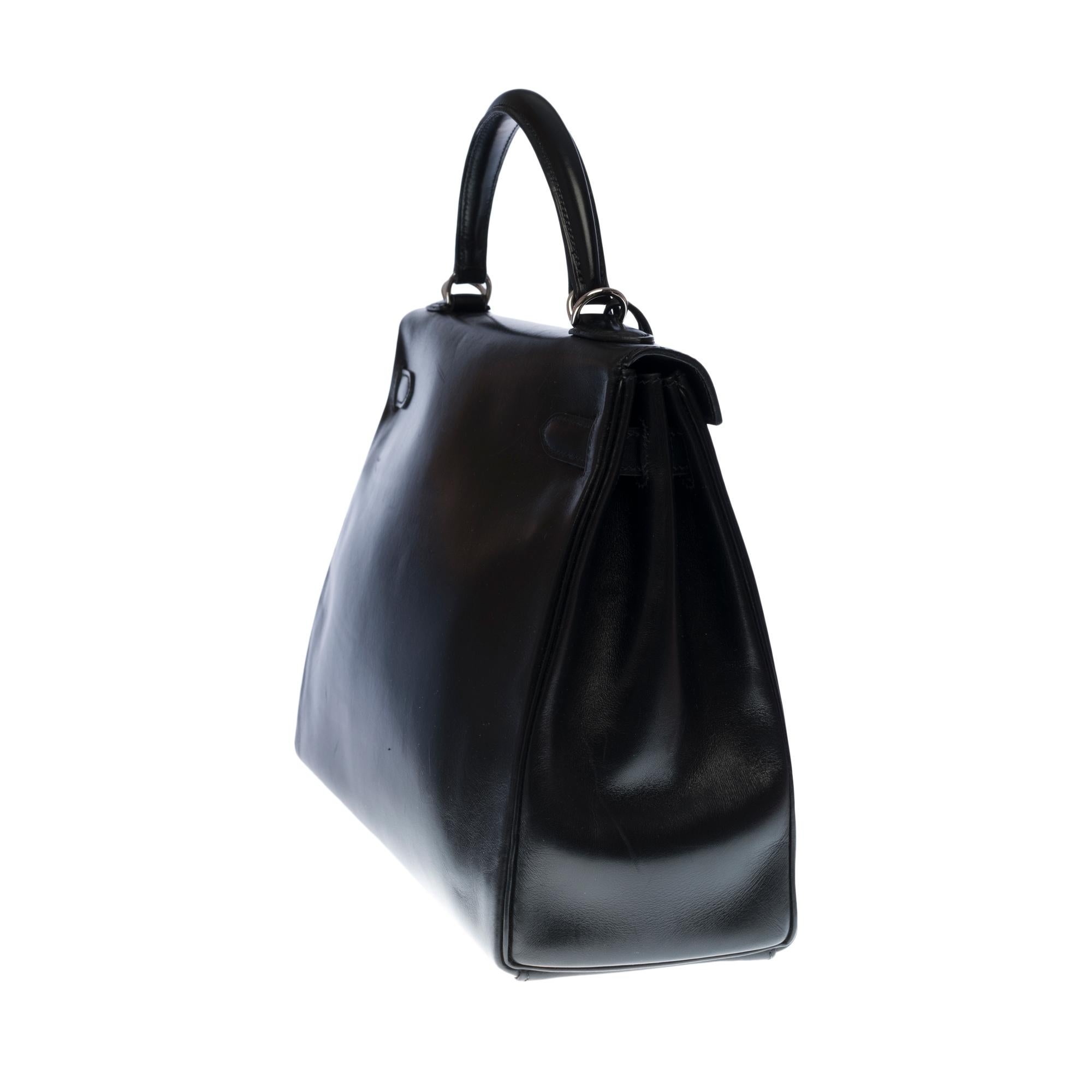 Black Rare Hermès Kelly 32 retourné handbag with strap in black calf leather, SHW