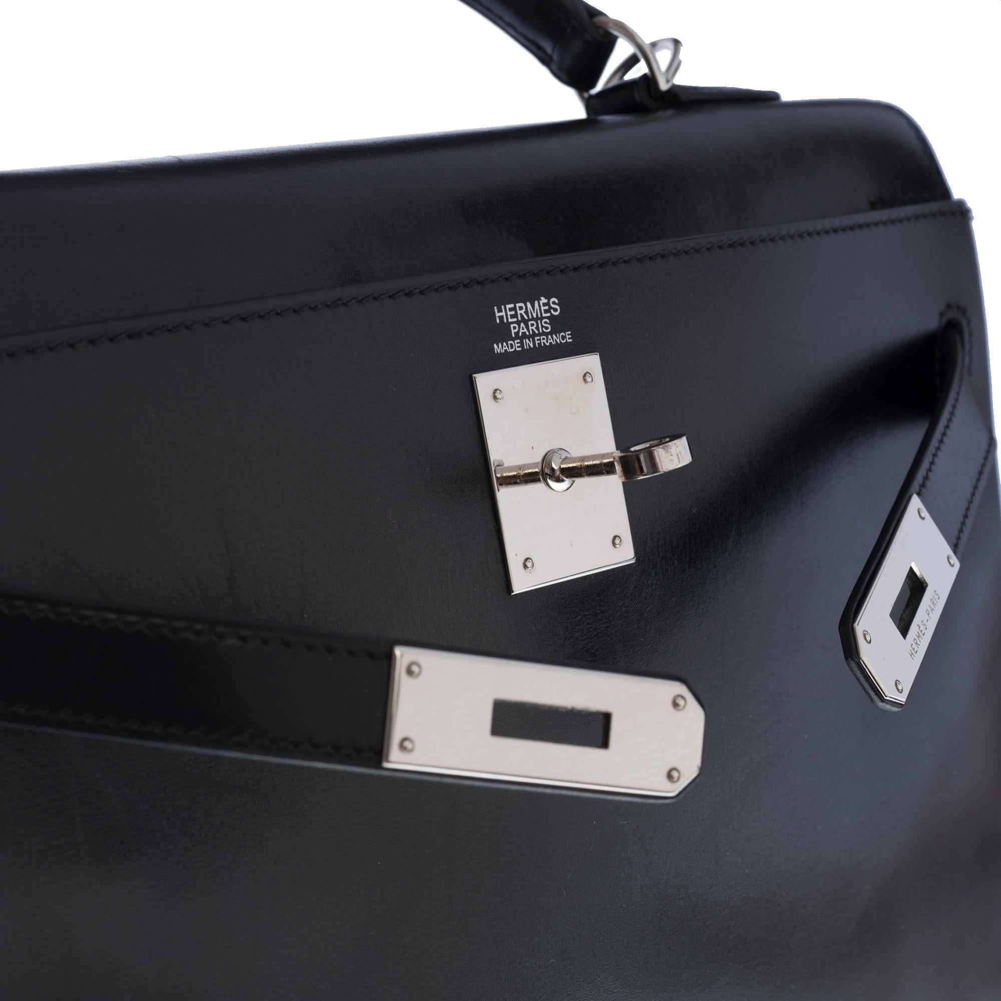 Rare Hermès Kelly 32 retourné handbag with strap in black calf leather, SHW In Good Condition In Paris, IDF