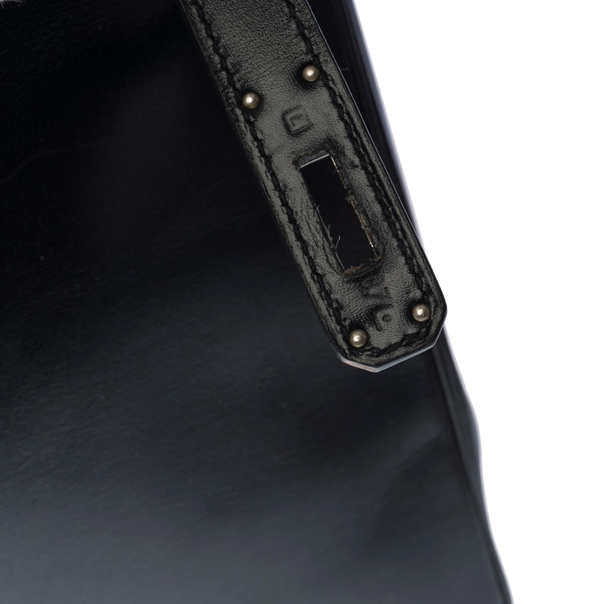 Women's or Men's Rare Hermès Kelly 32 retourné handbag with strap in black calf leather, SHW