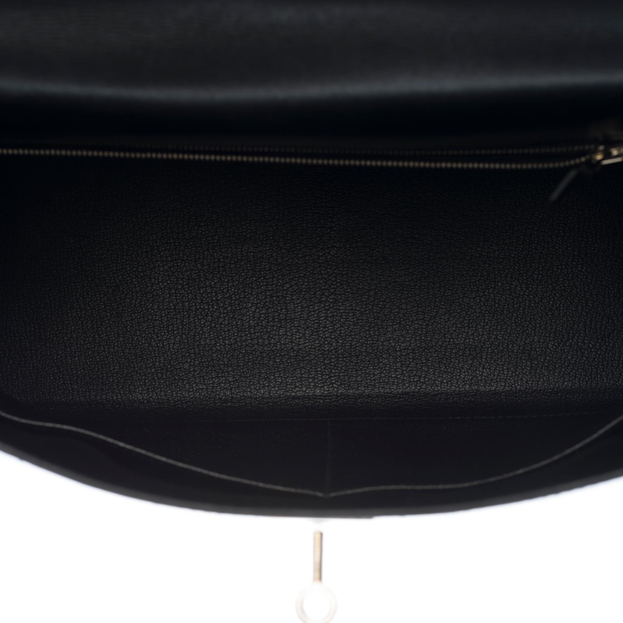 Rare Hermès Kelly 32 retourné handbag with strap in black calf leather, SHW 1