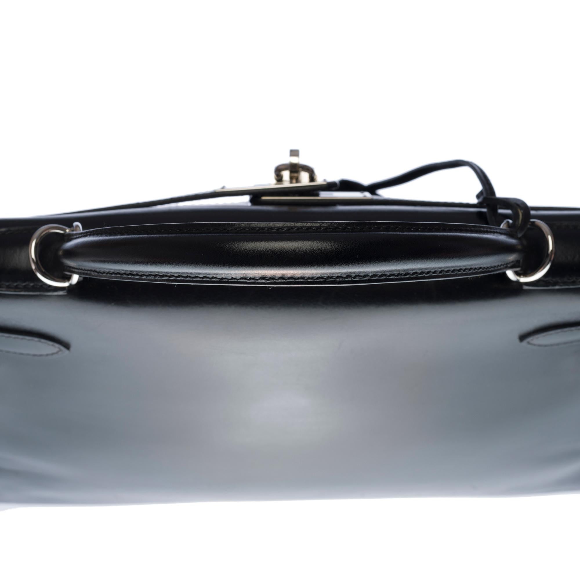 Rare Hermès Kelly 32 retourné handbag with strap in black calf leather, SHW 2