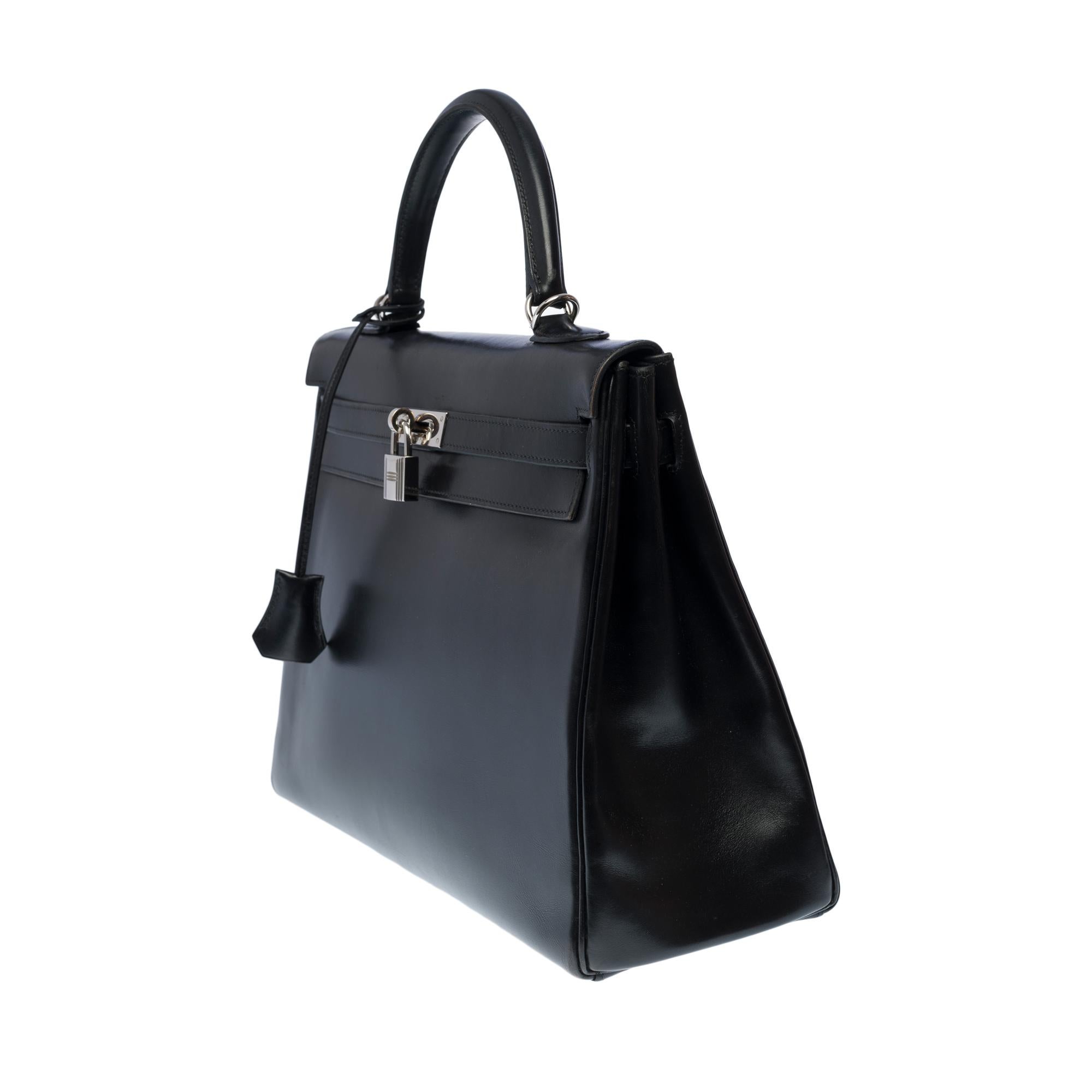 Rare Hermès Kelly 35 retourné handbag strap in Black Calf leather, SHW In Excellent Condition In Paris, IDF