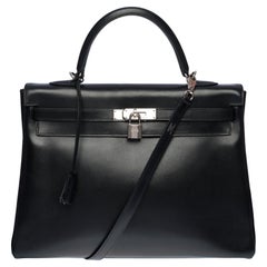 Rare Hermès Kelly 35 retourné handbag strap in Black Calf leather, SHW
